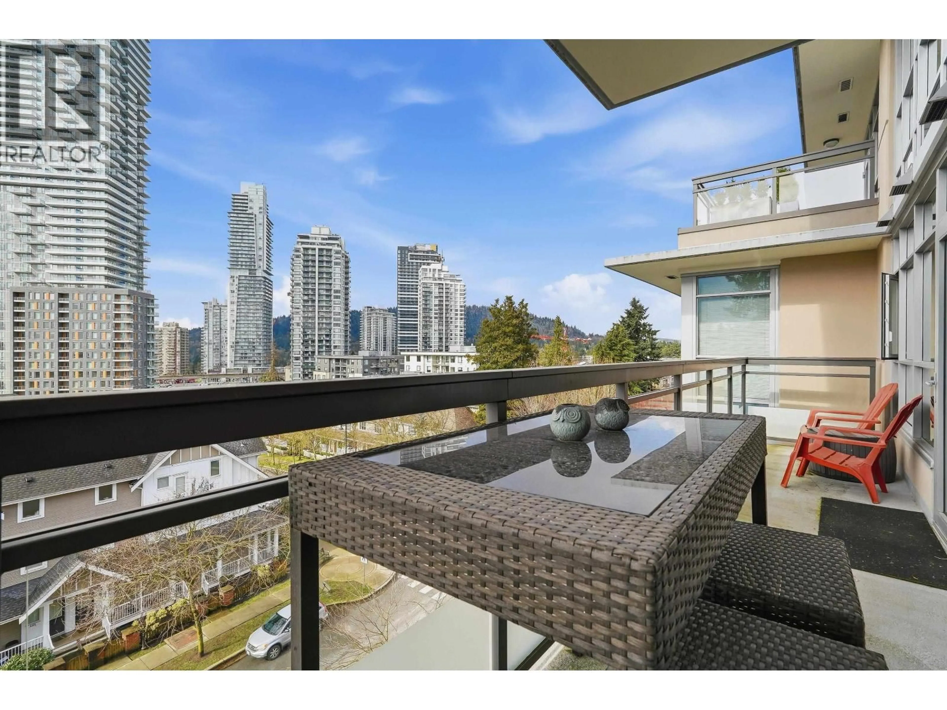 Balcony in the apartment, city buildings view from balcony for 707 - 711 BRESLAY STREET, Coquitlam British Columbia V3J0G7