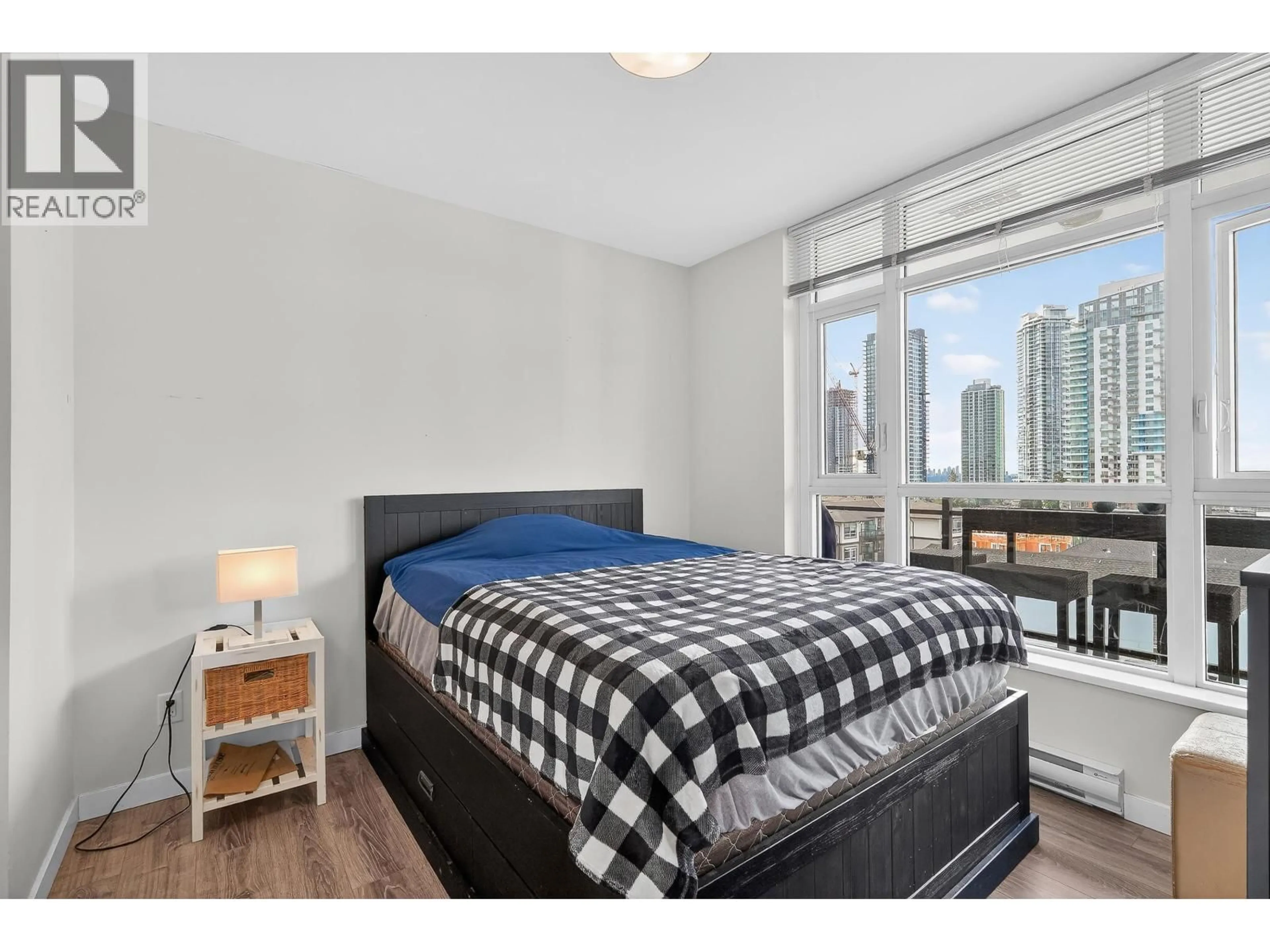 Bedroom with bed, wood/laminate floor for 707 - 711 BRESLAY STREET, Coquitlam British Columbia V3J0G7