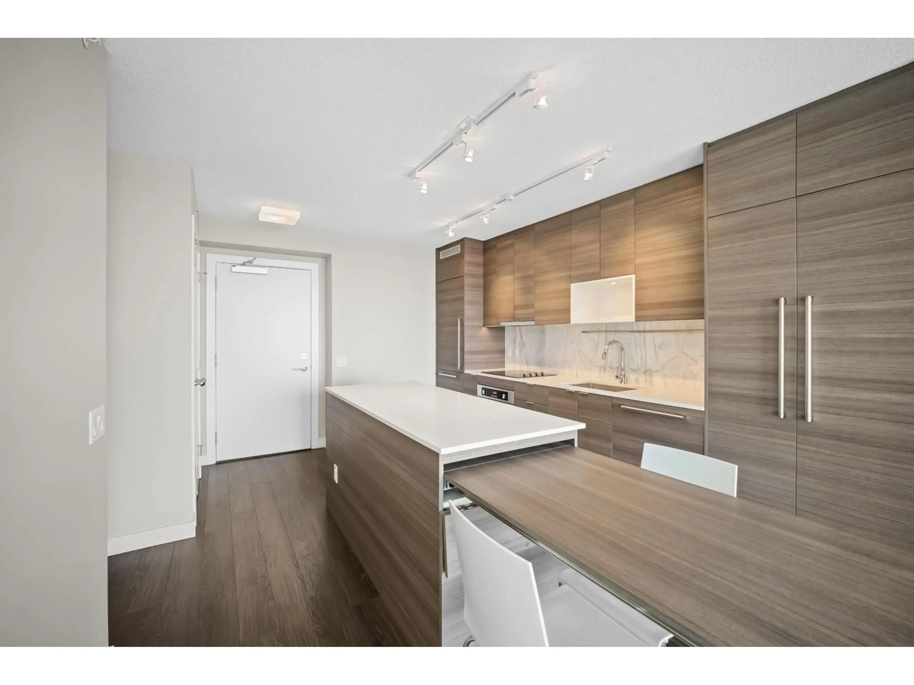 Open concept kitchen, wood/laminate floor for 2901 - 13398 104 AVENUE, Surrey British Columbia V3T1V6