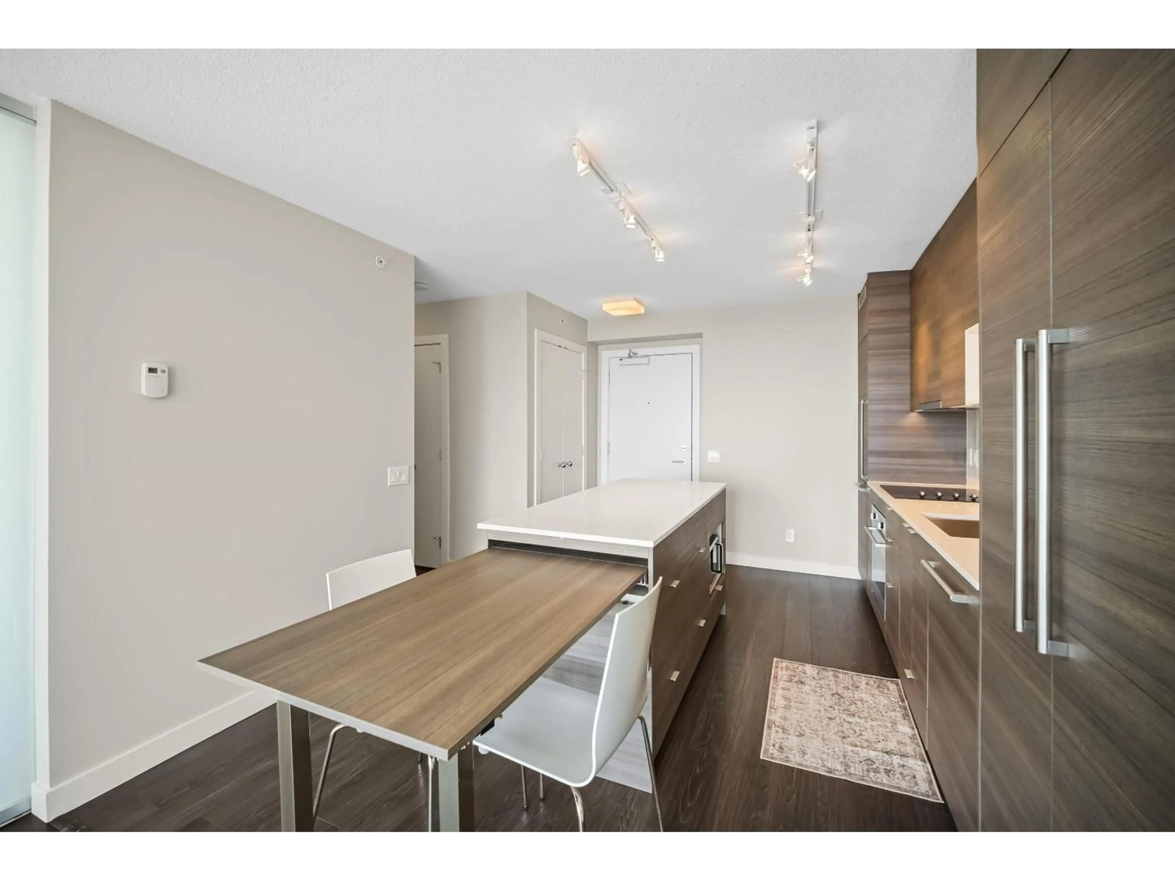 Open concept kitchen, wood/laminate floor for 2901 - 13398 104 AVENUE, Surrey British Columbia V3T1V6