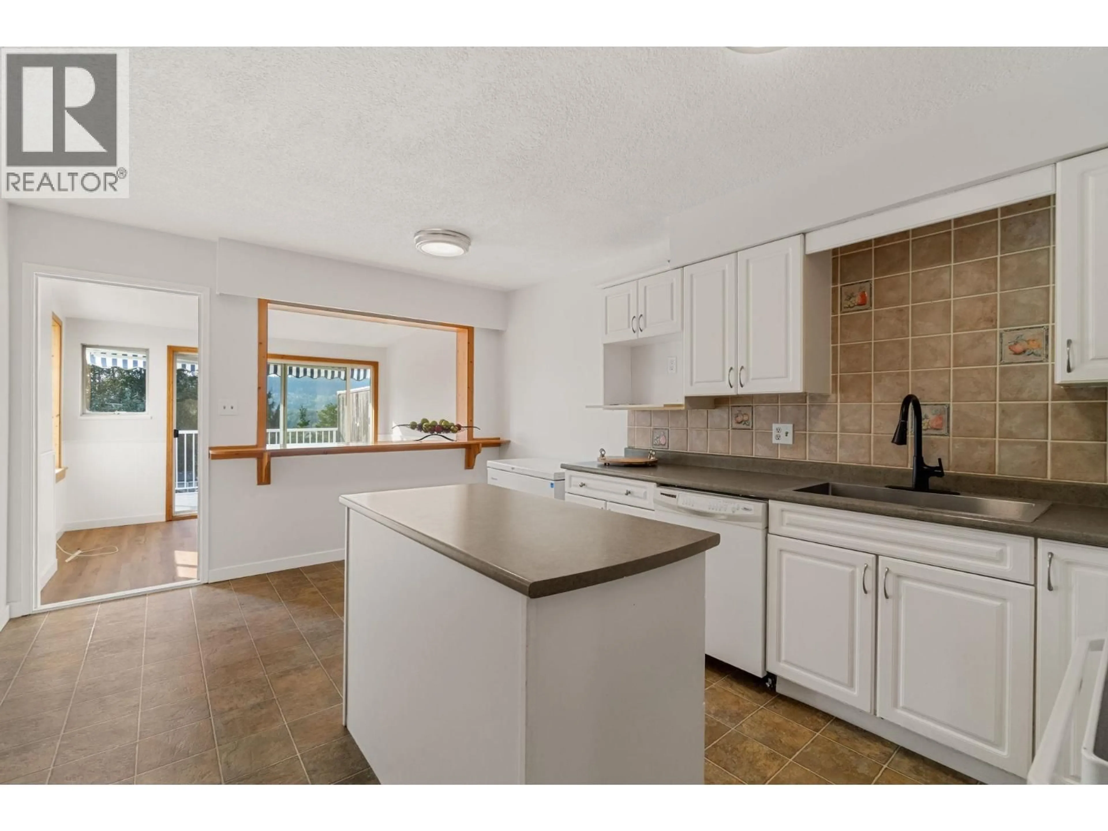 Open concept kitchen, ceramic/tile floor for 1431 ELINOR CRESCENT, Port Coquitlam British Columbia V3C2Y3