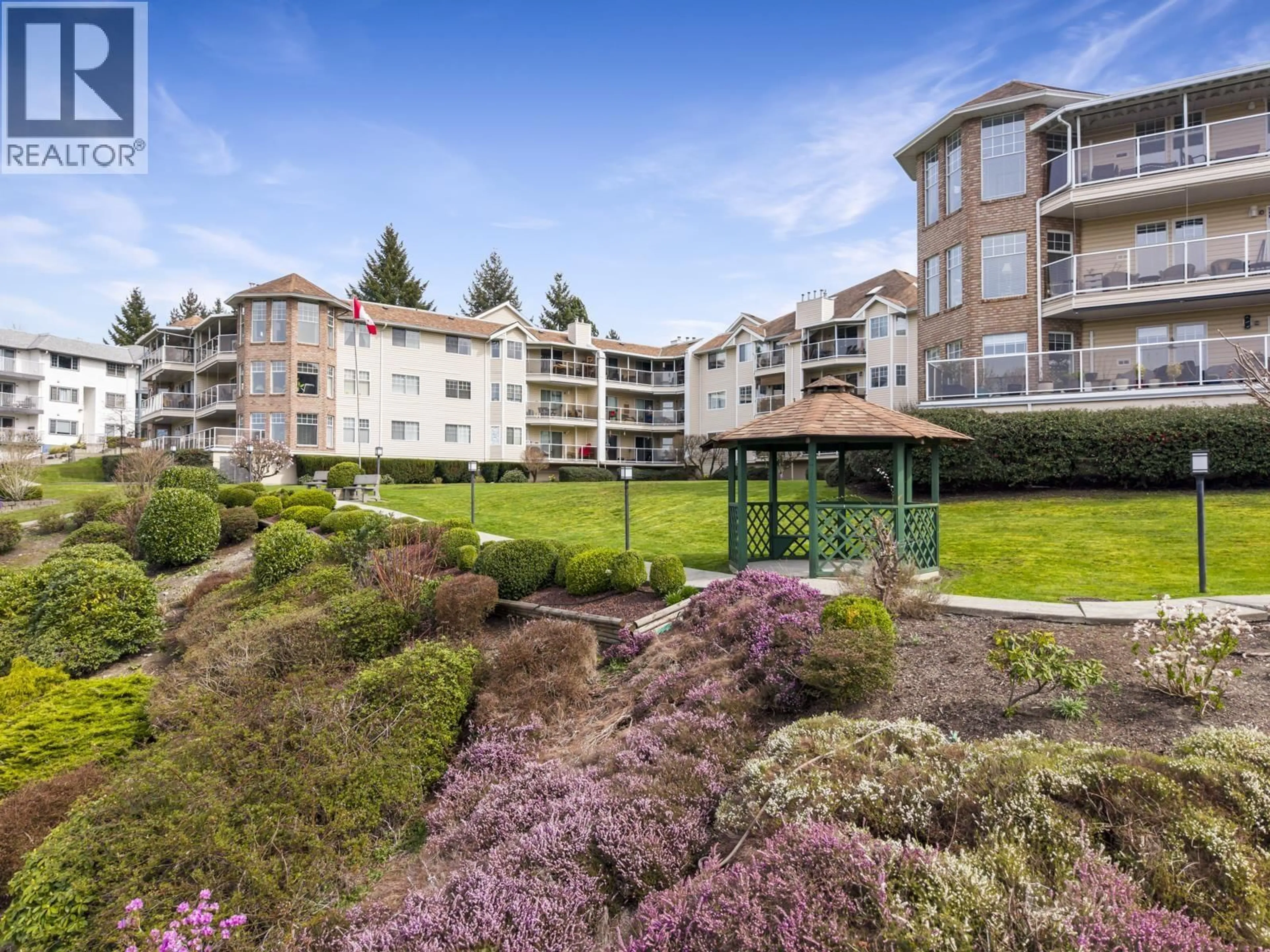 A pic from outside/outdoor area/front of a property/back of a property/a pic from drone, water/lake/river/ocean view for 208 - 22611 116 AVENUE, Maple Ridge British Columbia V2X0W7