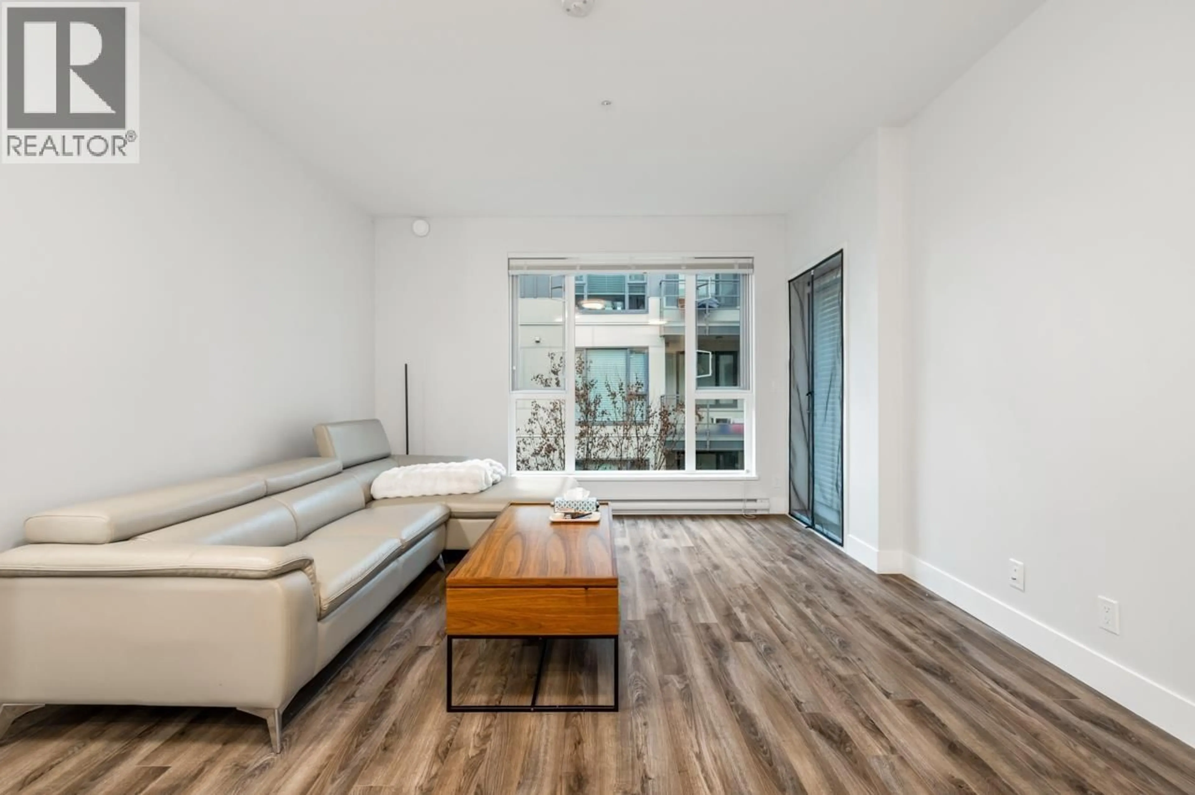 Living room with furniture, wood/laminate floor for 309 - 5355 LANE STREET, Burnaby British Columbia V5H0H1