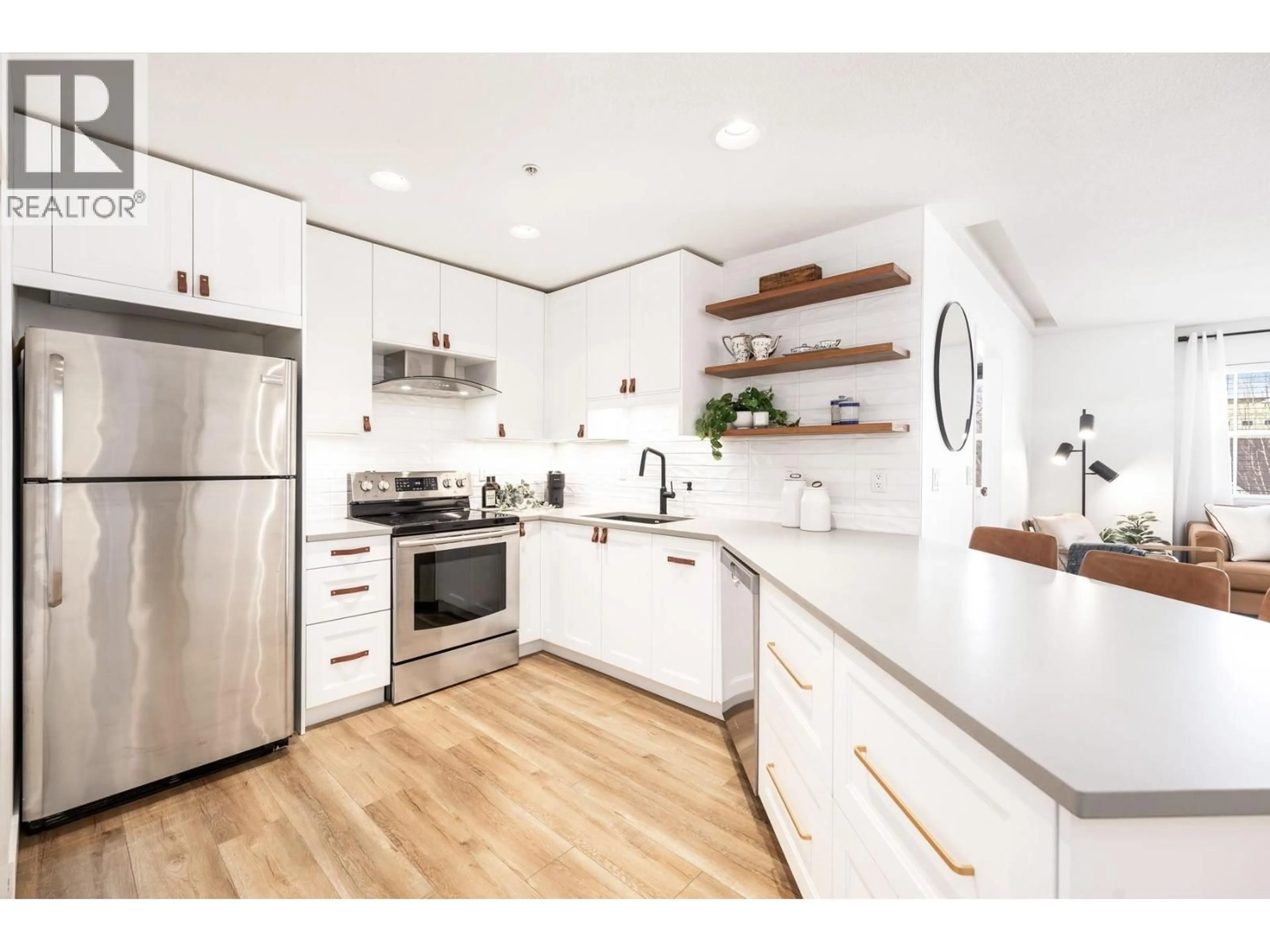 Open concept kitchen, wood/laminate floor for PH10 - 1702 56 STREET, Tsawwassen British Columbia V4L2P5