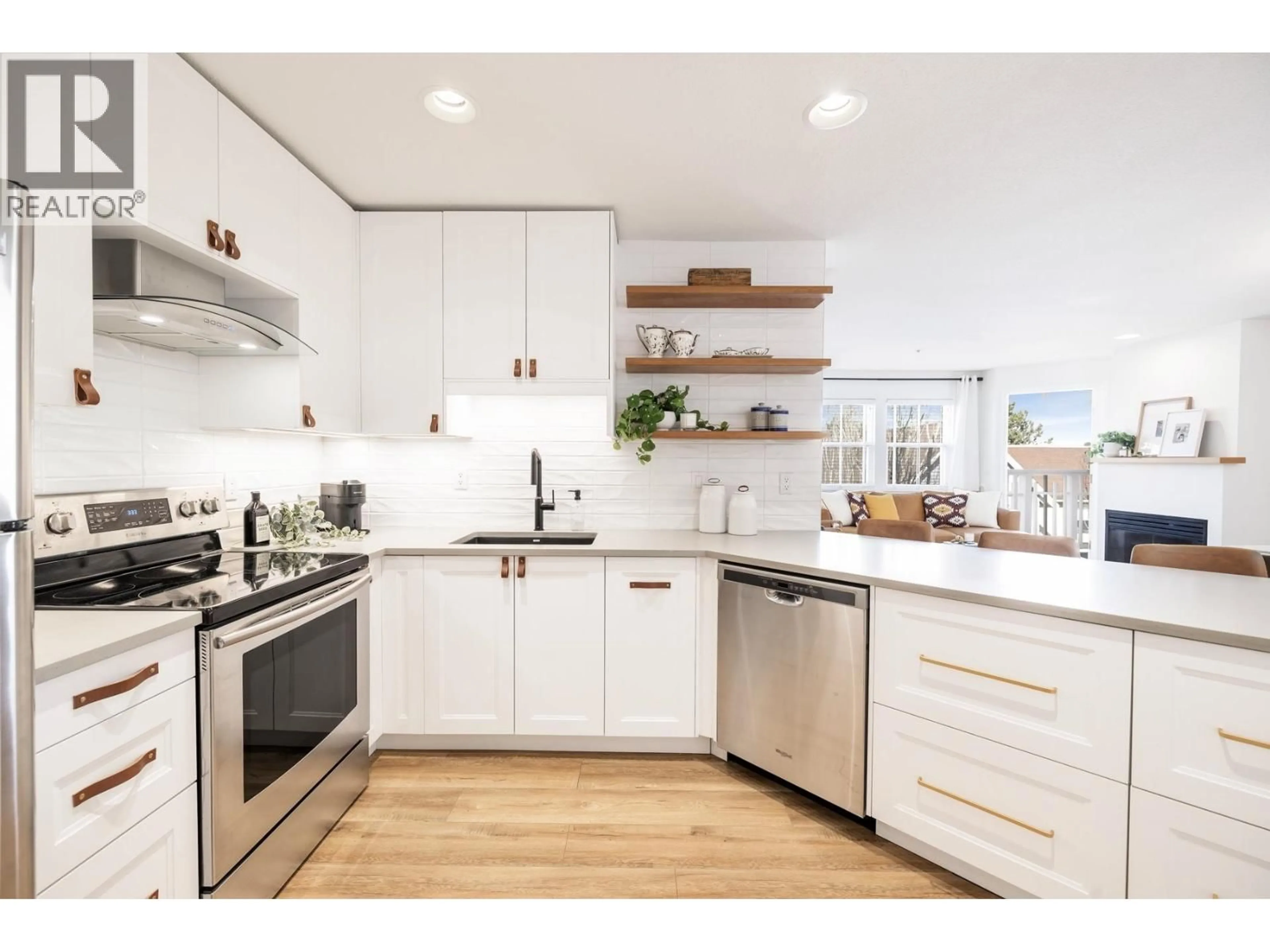 Open concept kitchen, wood/laminate floor for PH10 - 1702 56 STREET, Tsawwassen British Columbia V4L2P5