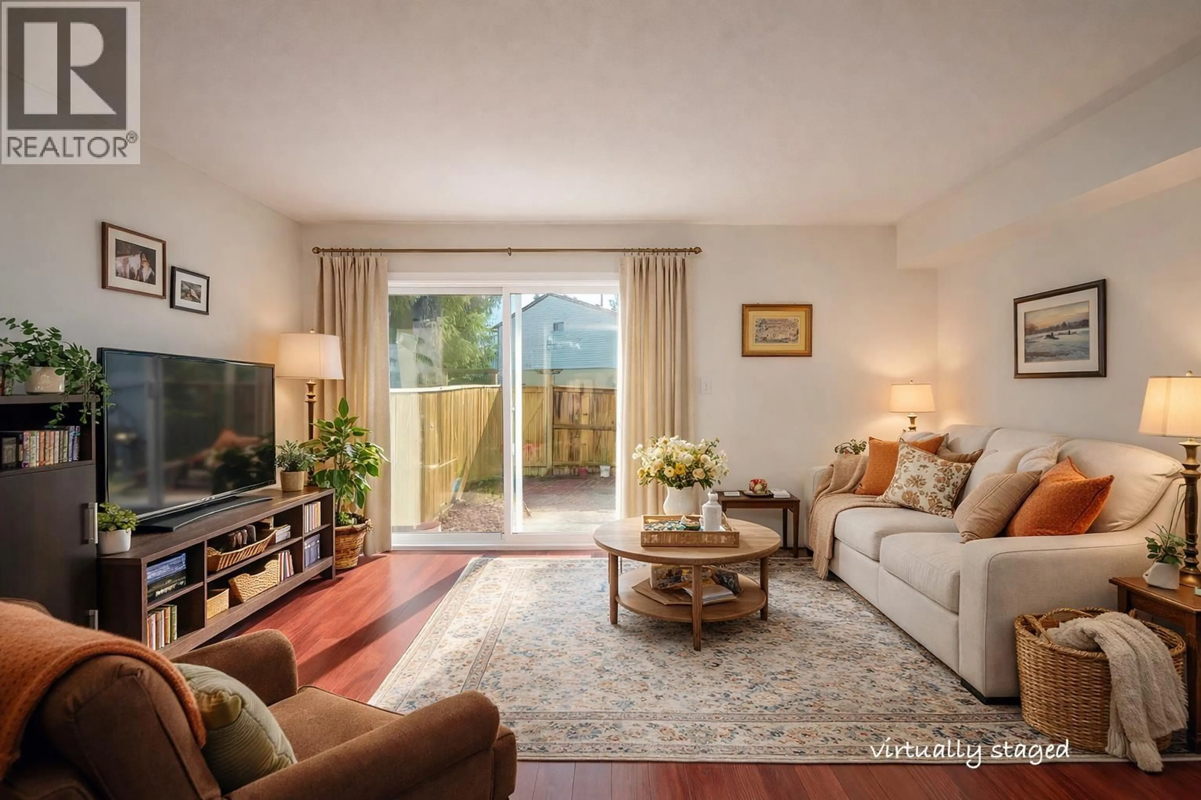 Living room with furniture, wood/laminate floor for 6866 ARLINGTON STREET, Vancouver British Columbia V5S3N9