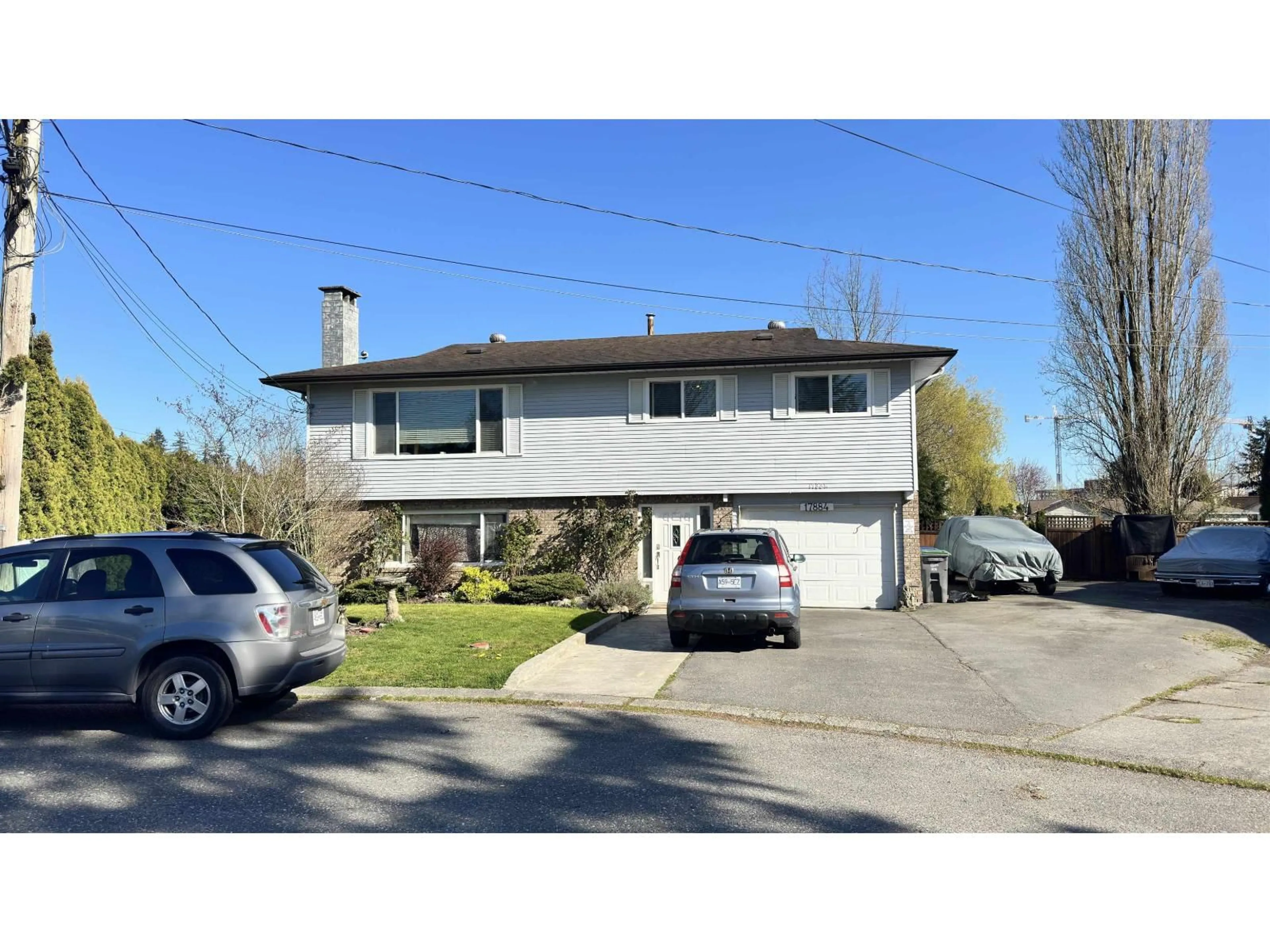 Home with vinyl exterior material, street for 17884 57 AVENUE, Surrey British Columbia V3S1H3