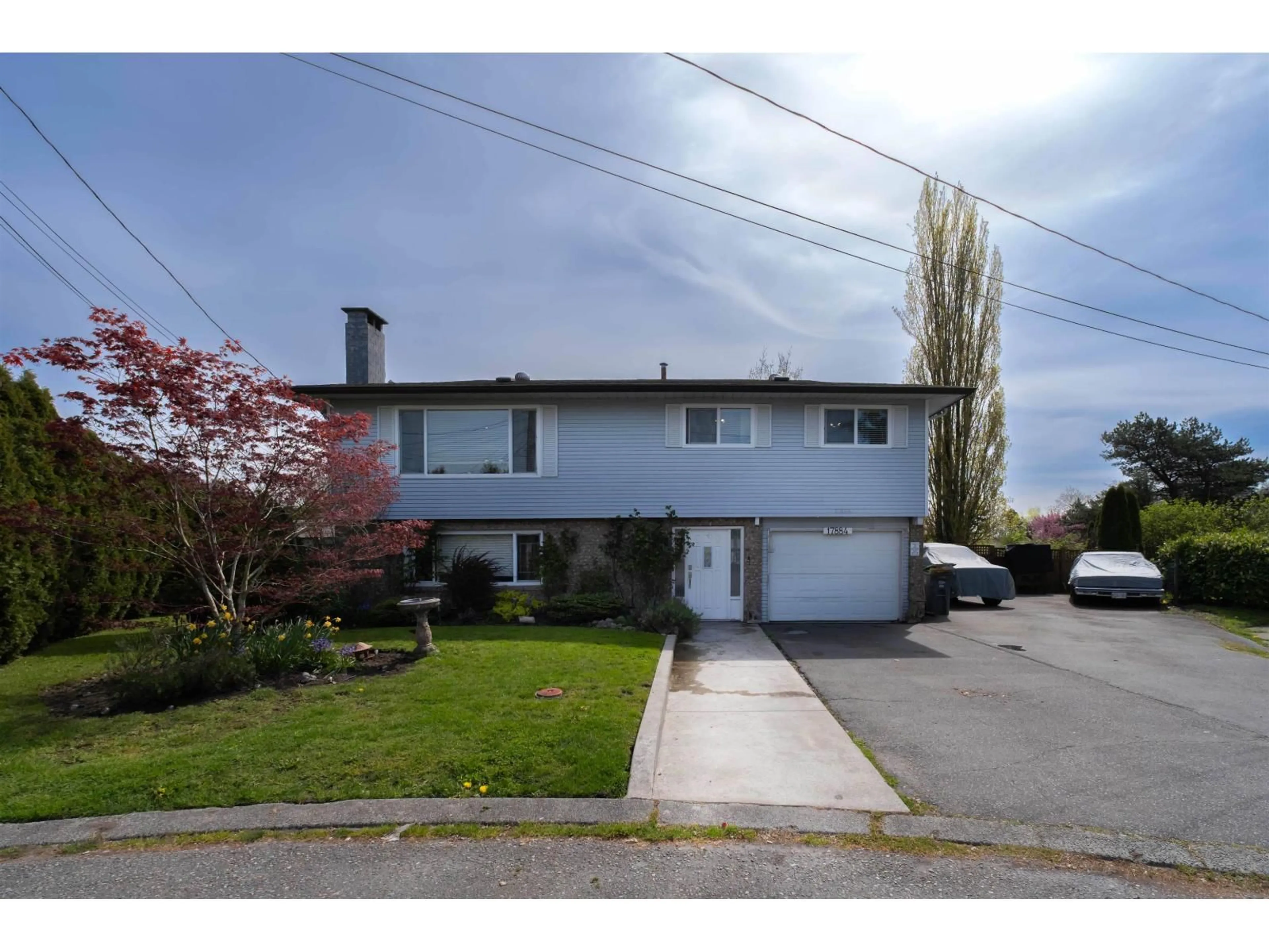 Home with vinyl exterior material, street for 17884 57 AVENUE, Surrey British Columbia V3S1H3