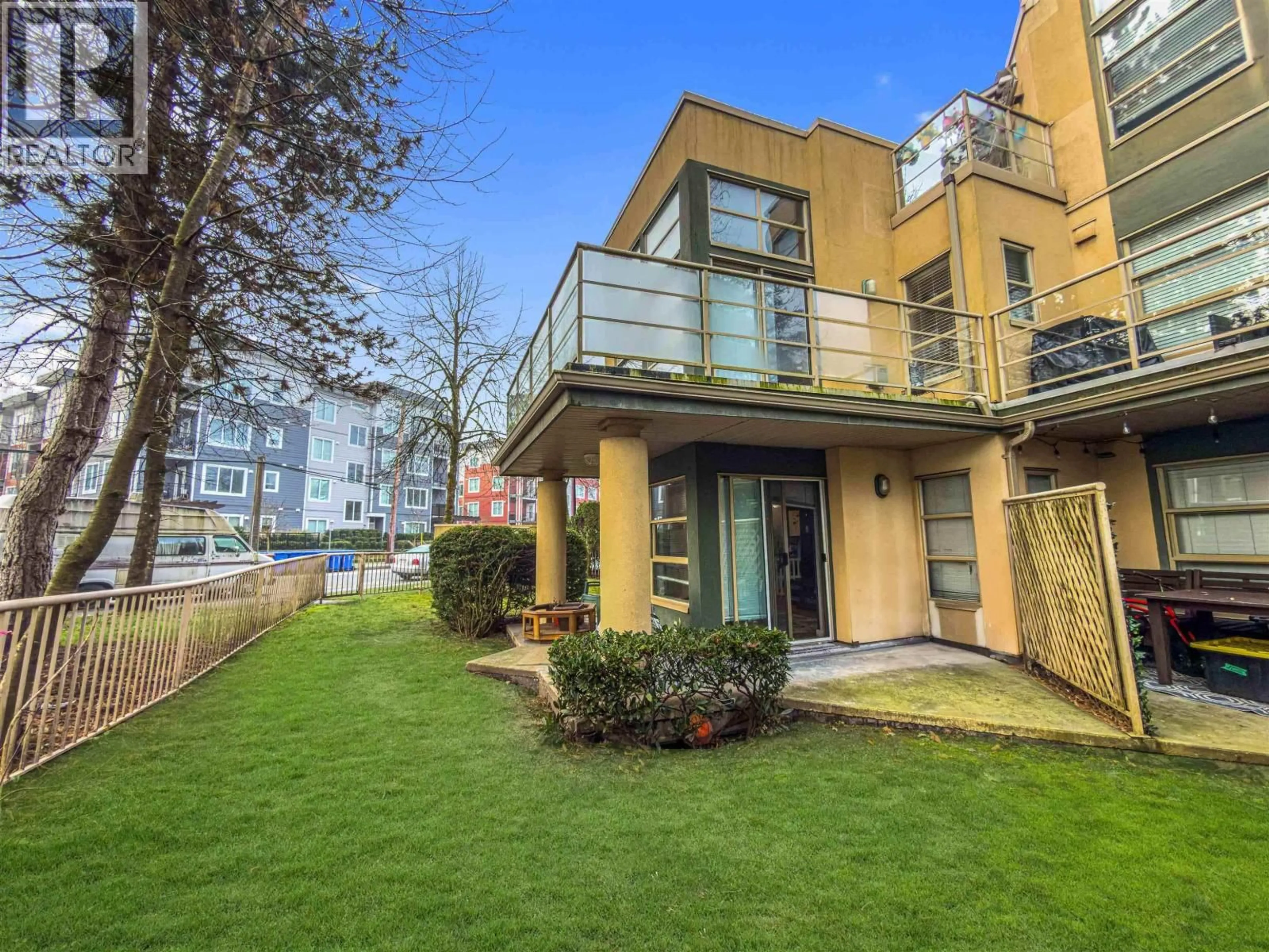 A pic from outside/outdoor area/front of a property/back of a property/a pic from drone, street for 101 - 22277 122 AVENUE, Maple Ridge British Columbia V2X3X8