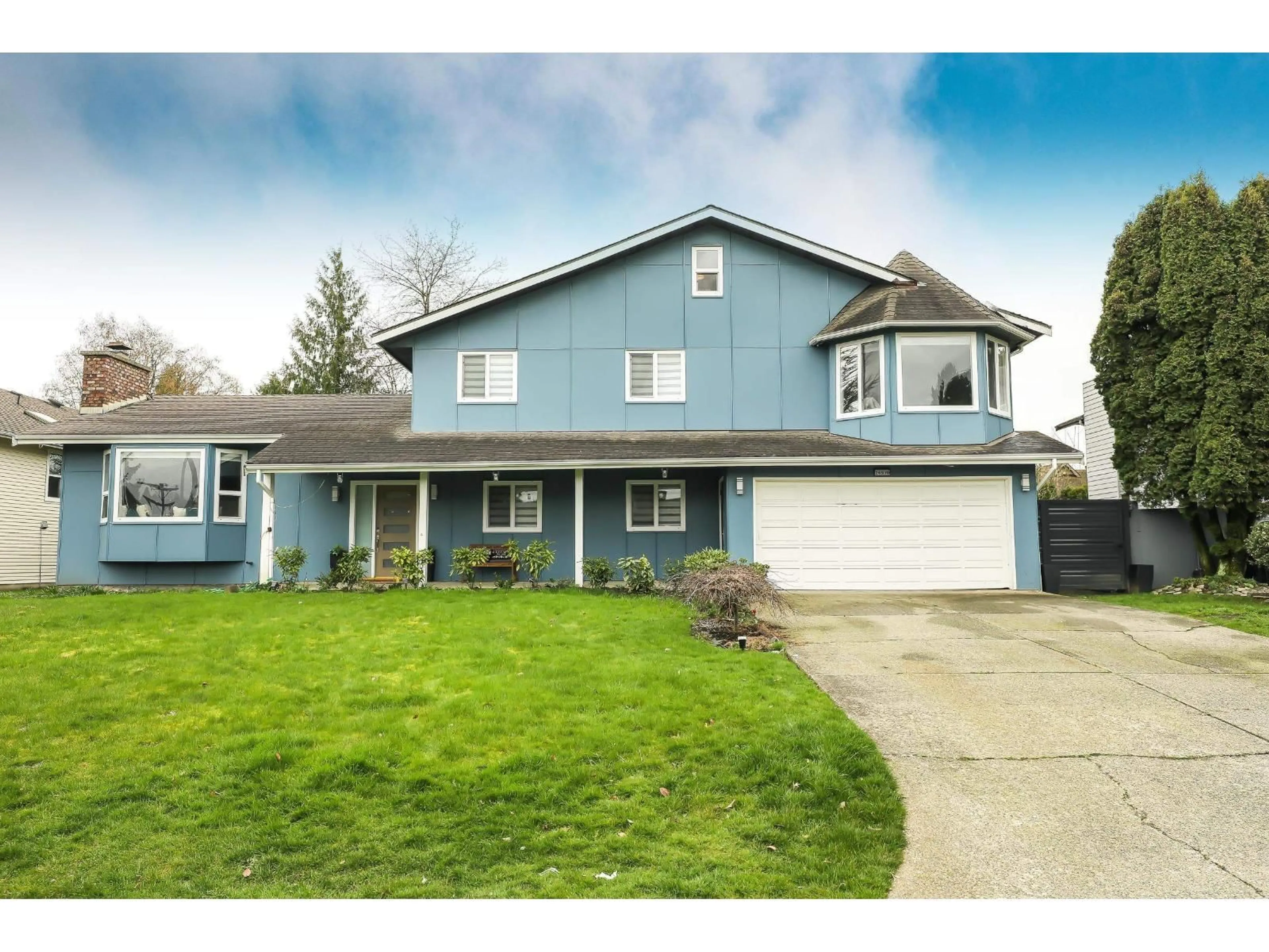 Home with vinyl exterior material, street for 26970 32A AVENUE, Langley British Columbia V4W3G5