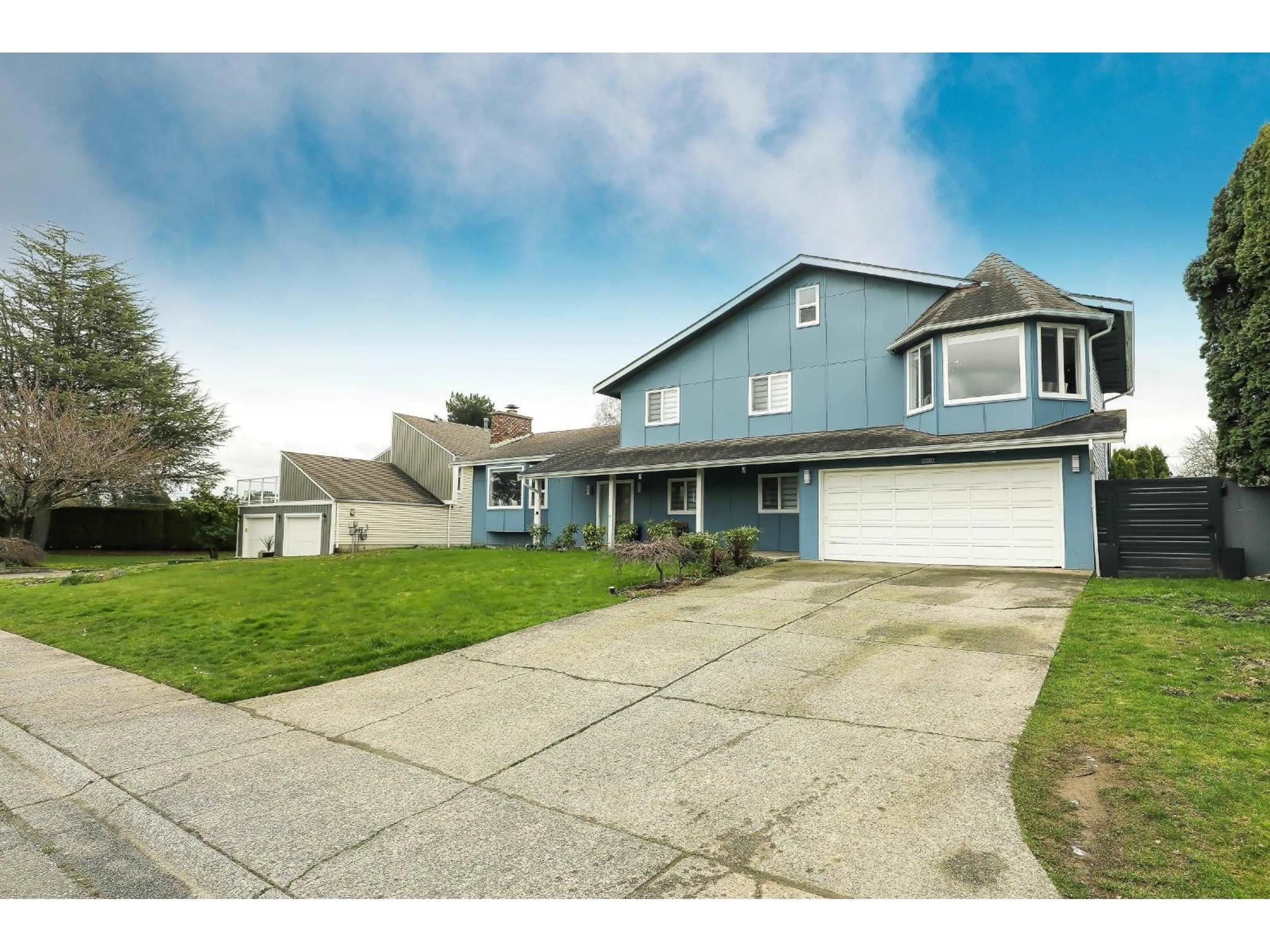 Home with vinyl exterior material, street for 26970 32A AVENUE, Langley British Columbia V4W3G5