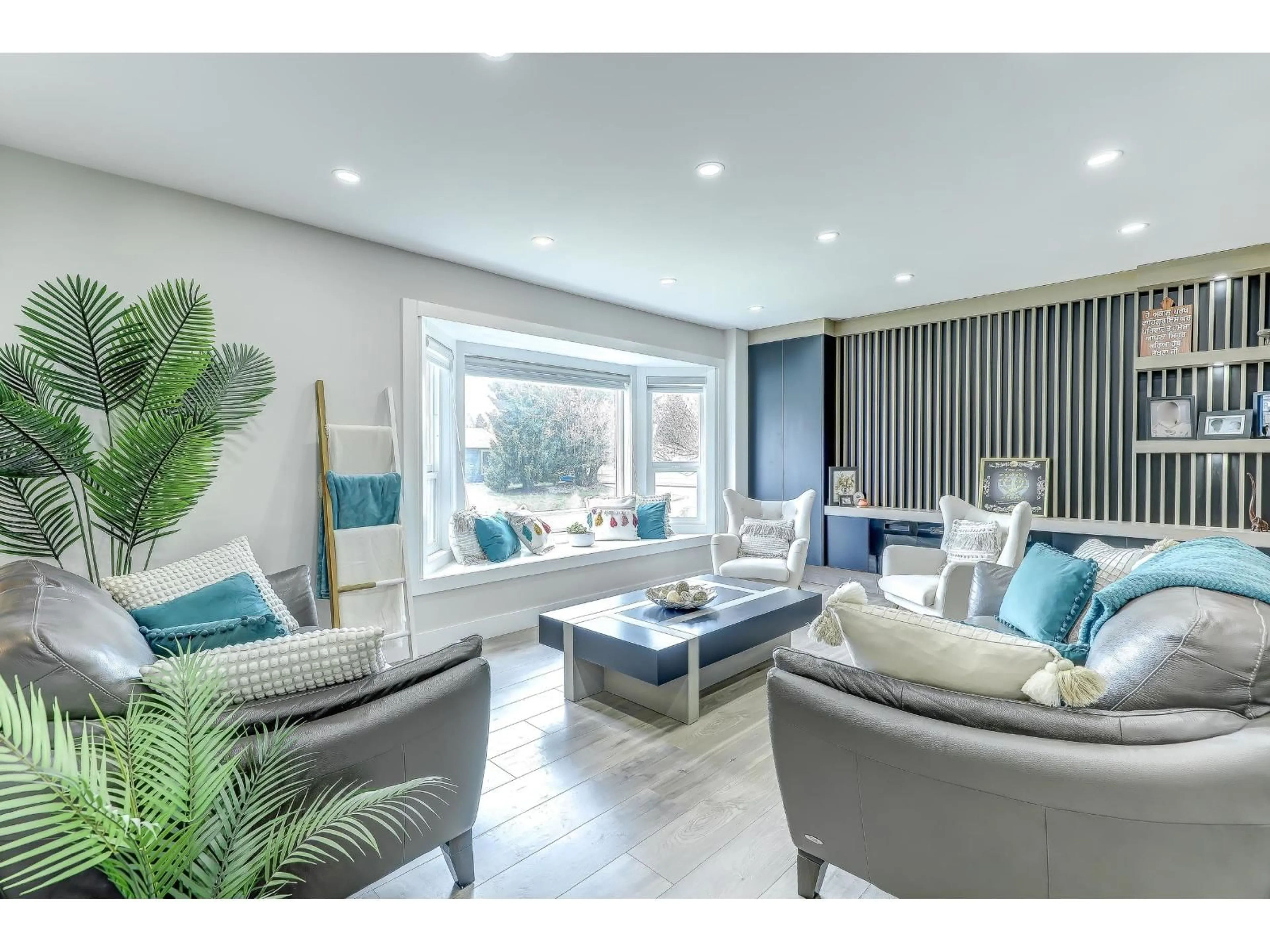 Living room with furniture, wood/laminate floor for 26970 32A AVENUE, Langley British Columbia V4W3G5