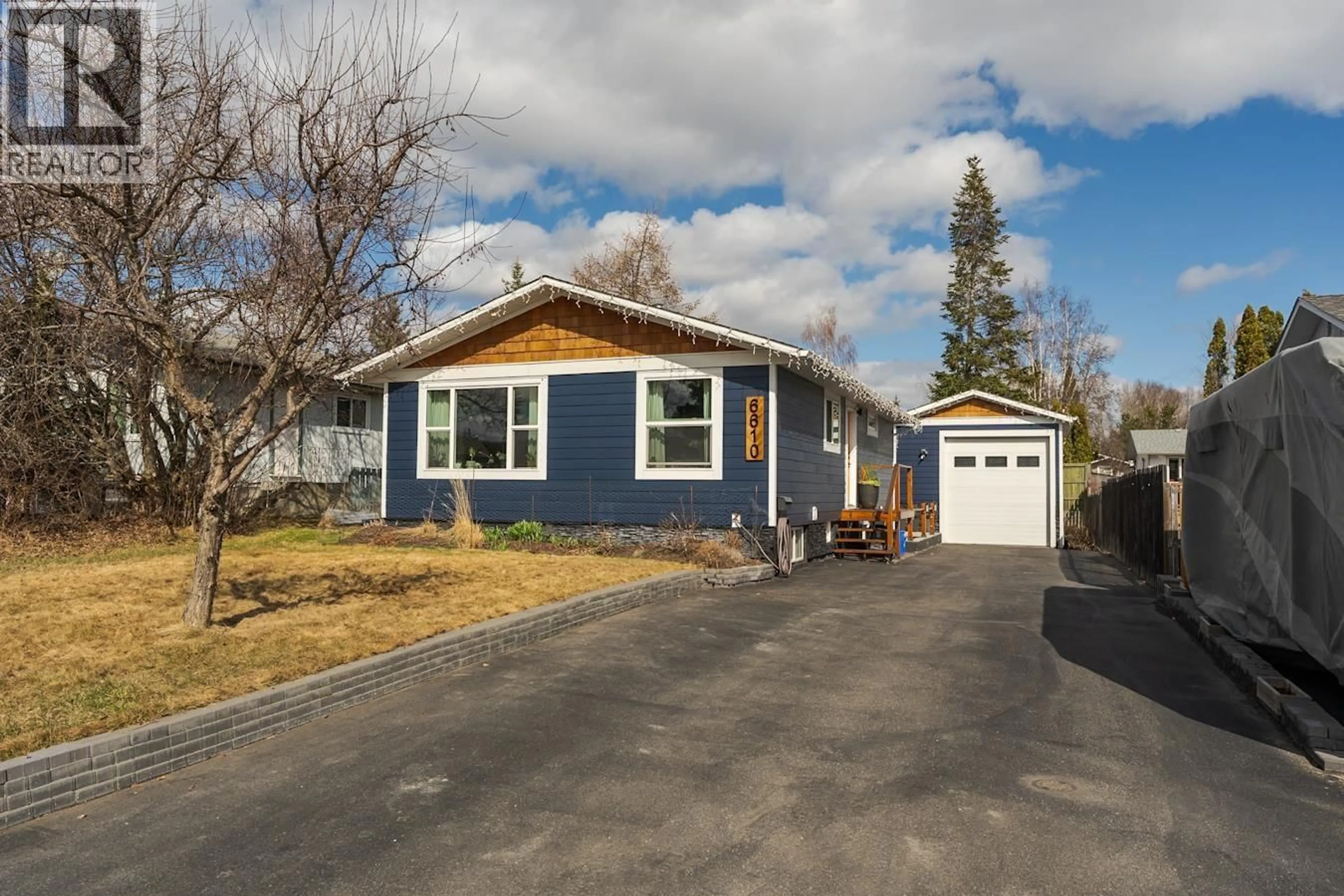 Home with vinyl exterior material, street for 6610 ESSEX CRESCENT, Prince George British Columbia V2N2P1