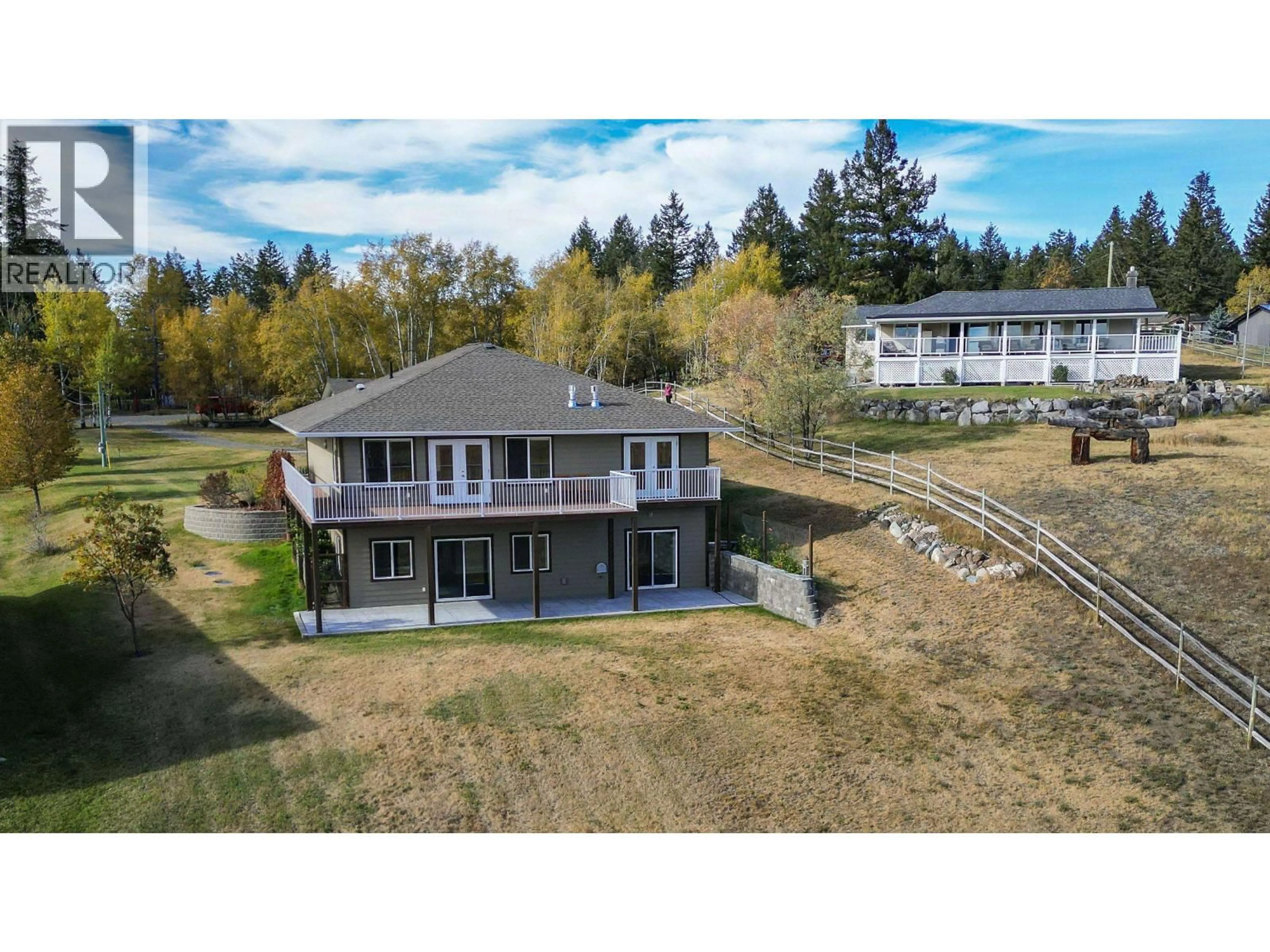 A pic from outside/outdoor area/front of a property/back of a property/a pic from drone, water/lake/river/ocean view for 5072 BLOCK DRIVE, 108 Mile Ranch British Columbia V0K2Z0
