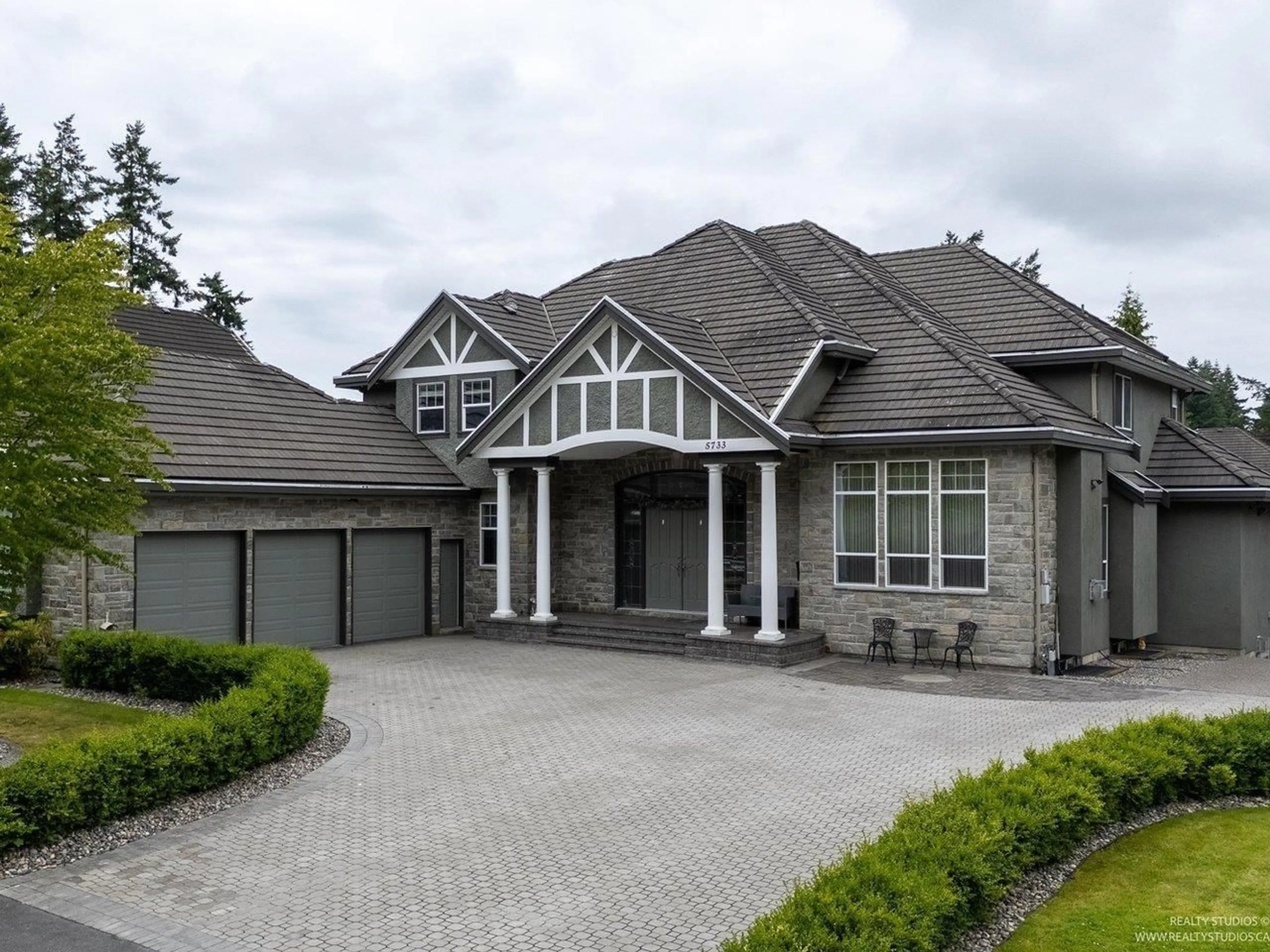 Home with brick exterior material, street for 5733 136B STREET, Surrey British Columbia V3X3N9