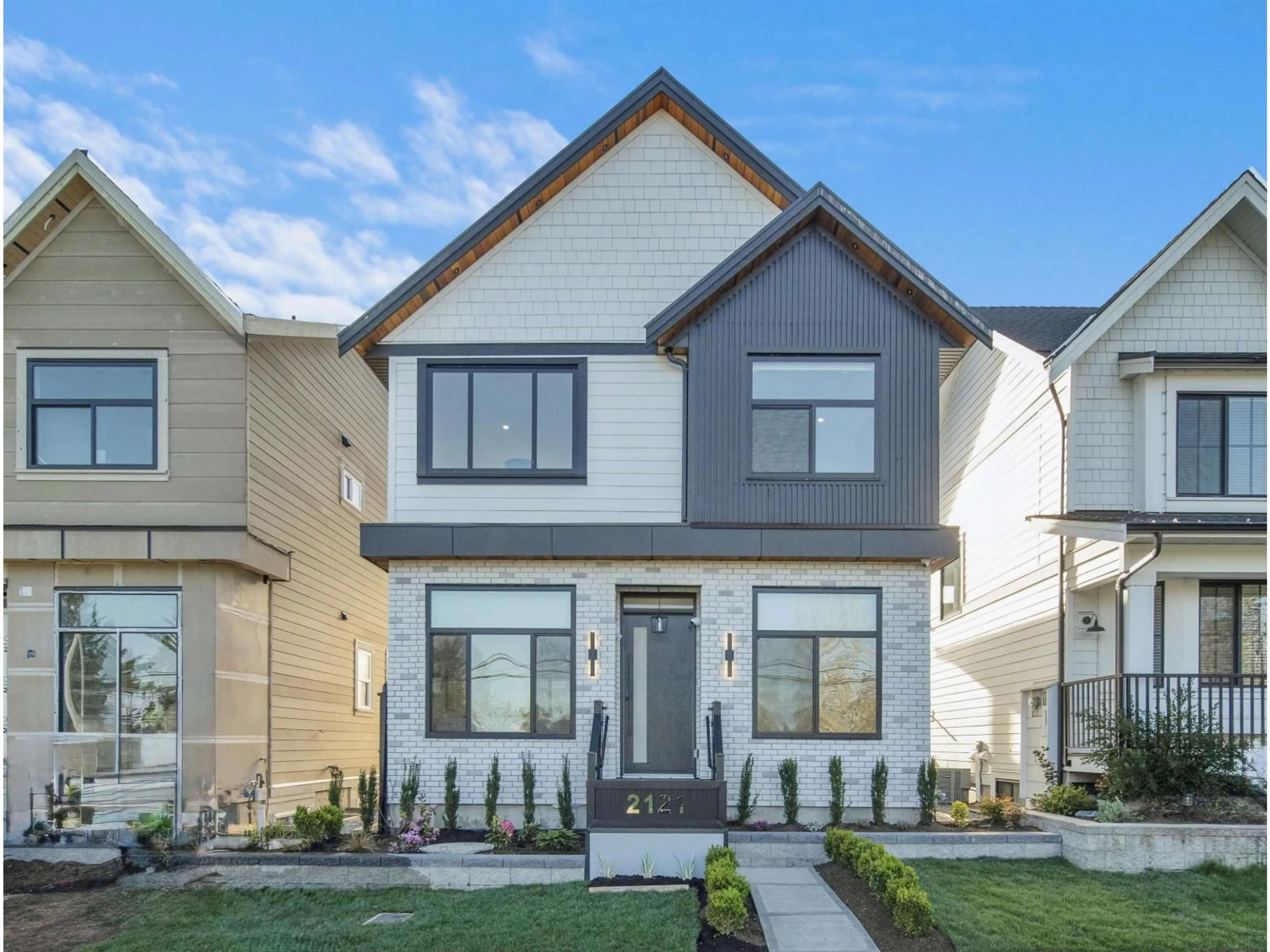 Home with vinyl exterior material, street for 2121 168 STREET, Surrey British Columbia V3Z0B5