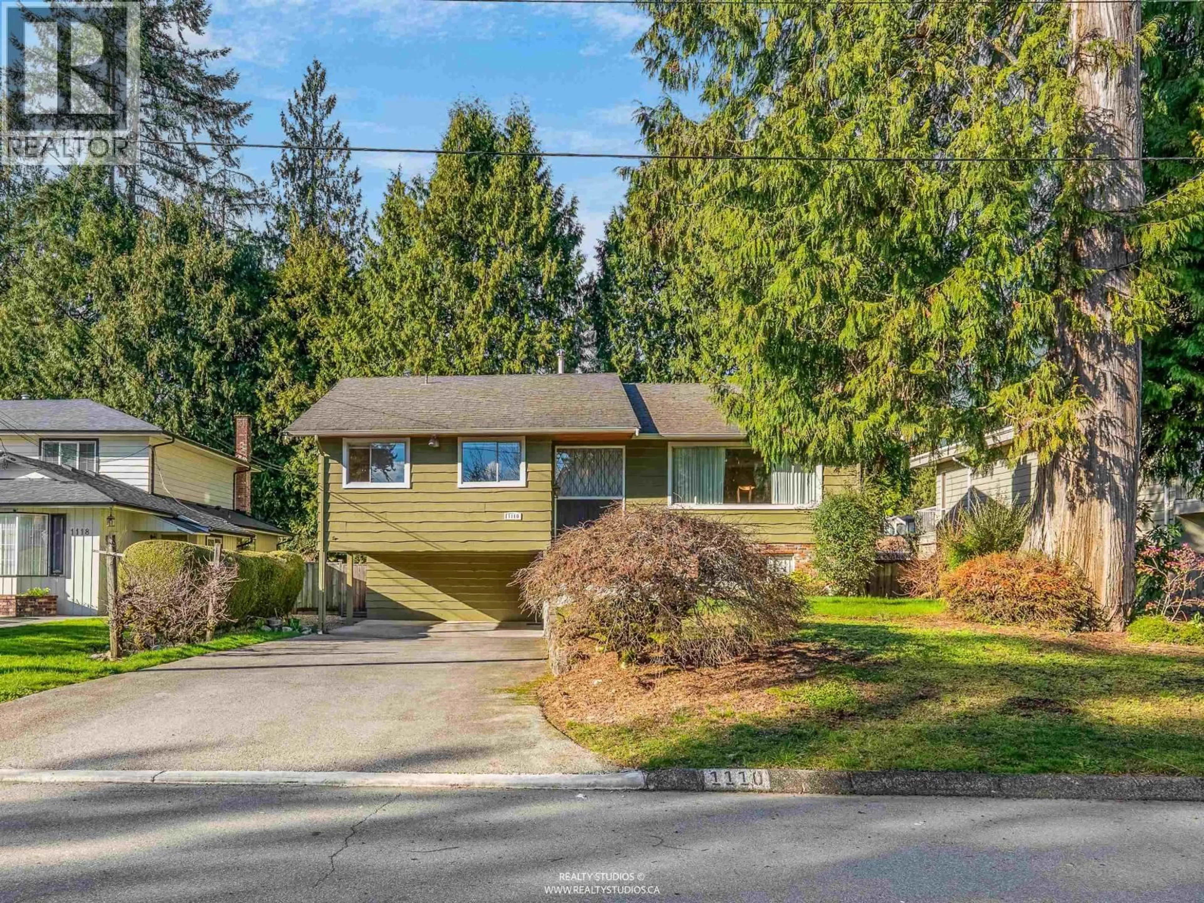 Home with vinyl exterior material, street for 1110 LODGE ROAD, North Vancouver British Columbia V7R1W8