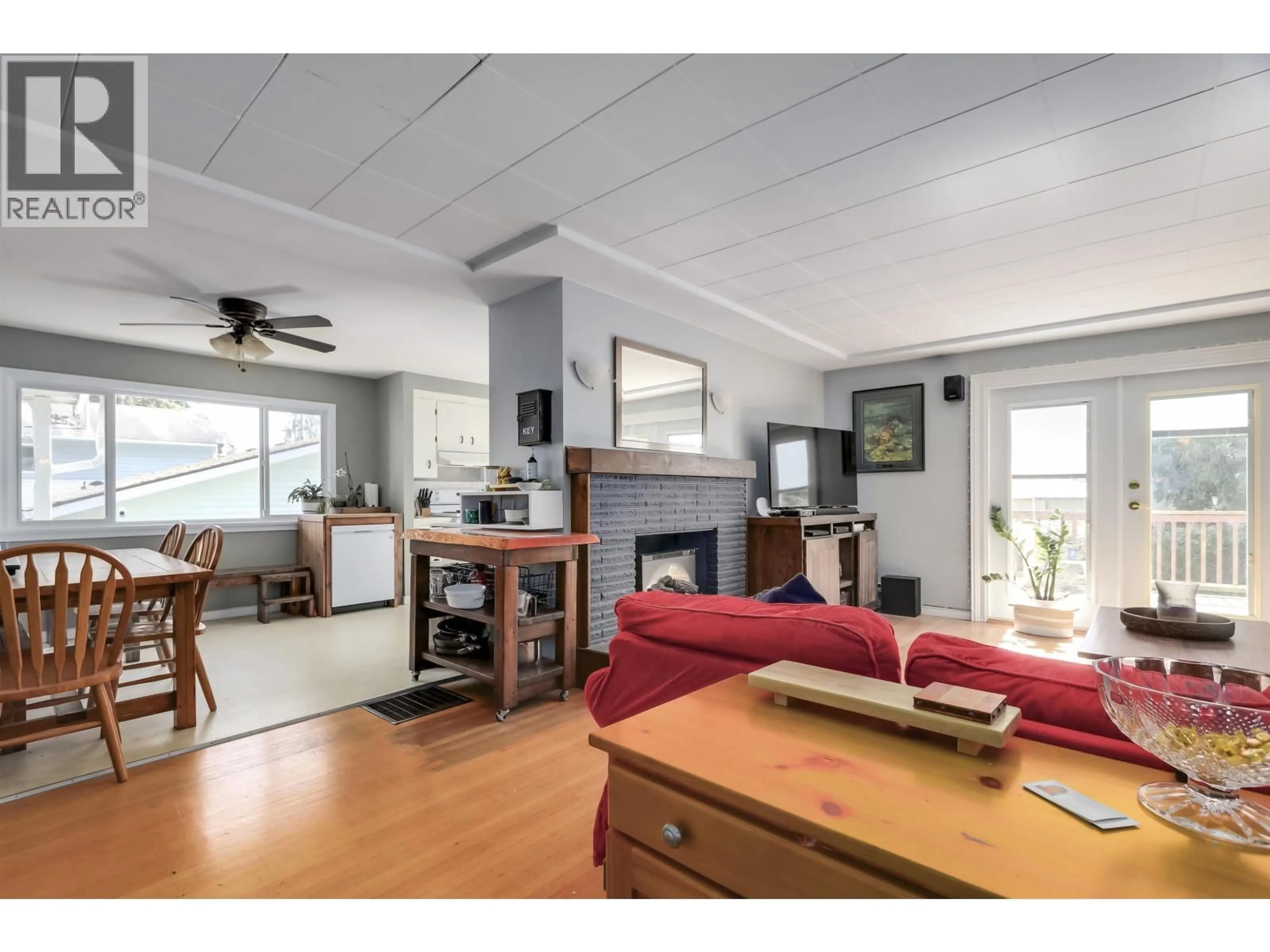 Living room with furniture, wood/laminate floor for 3530 HASTINGS STREET, Port Coquitlam British Columbia V3B4N4