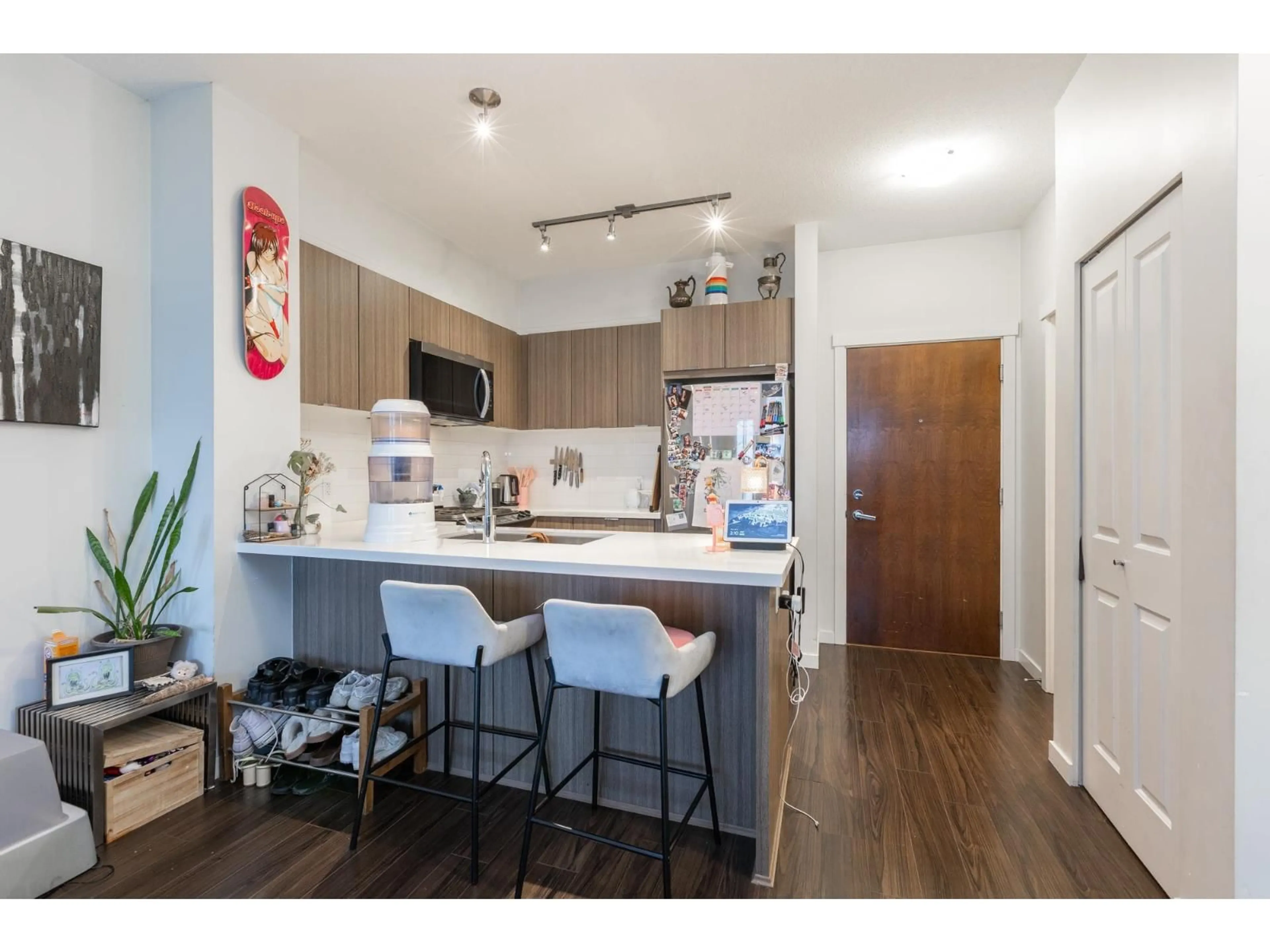 Open concept kitchen, wood/laminate floor for 413 - 3323 151 STREET, Surrey British Columbia V3Z0L3