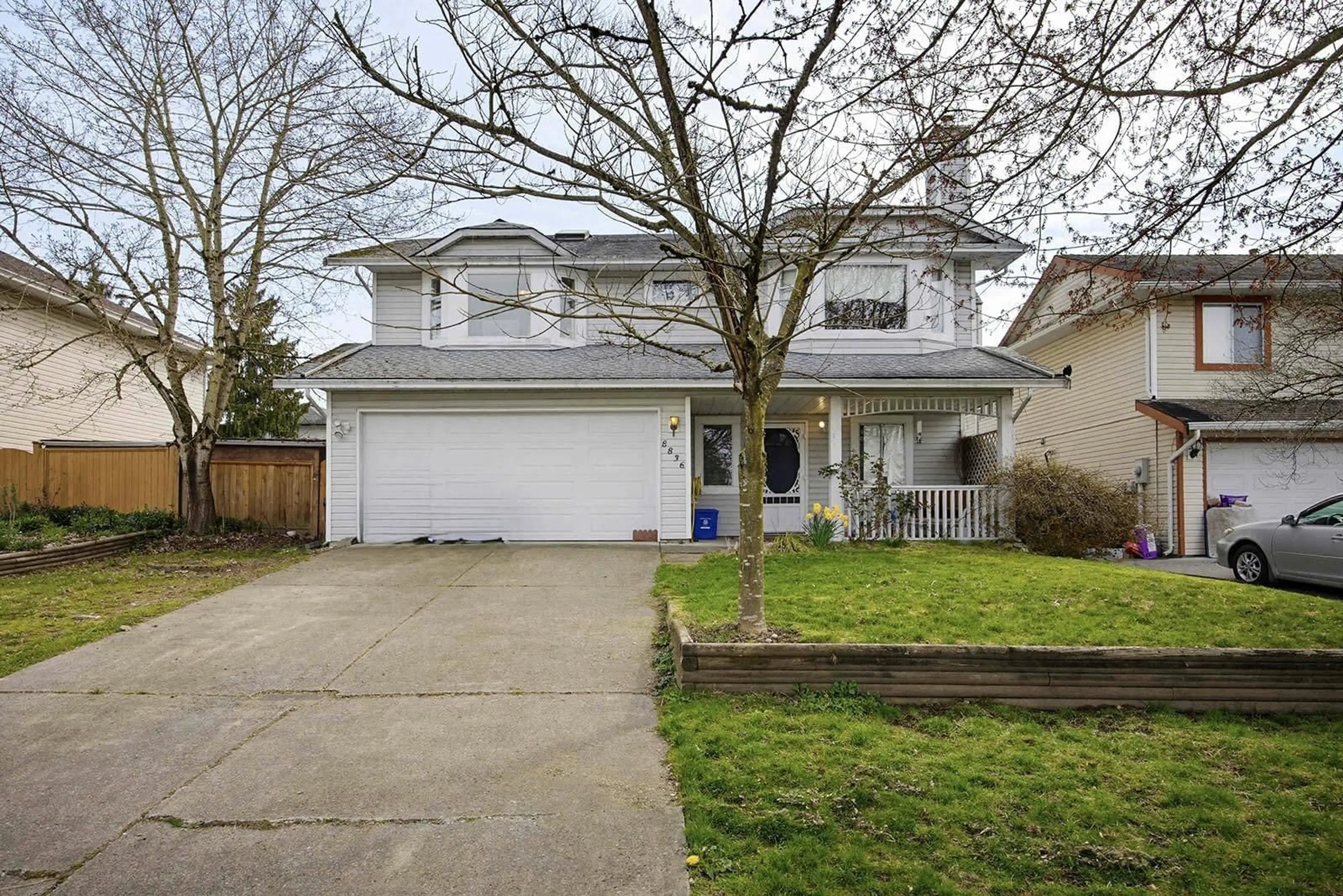 Home with vinyl exterior material, street for 8836 142A STREET, Surrey British Columbia V3V7W8