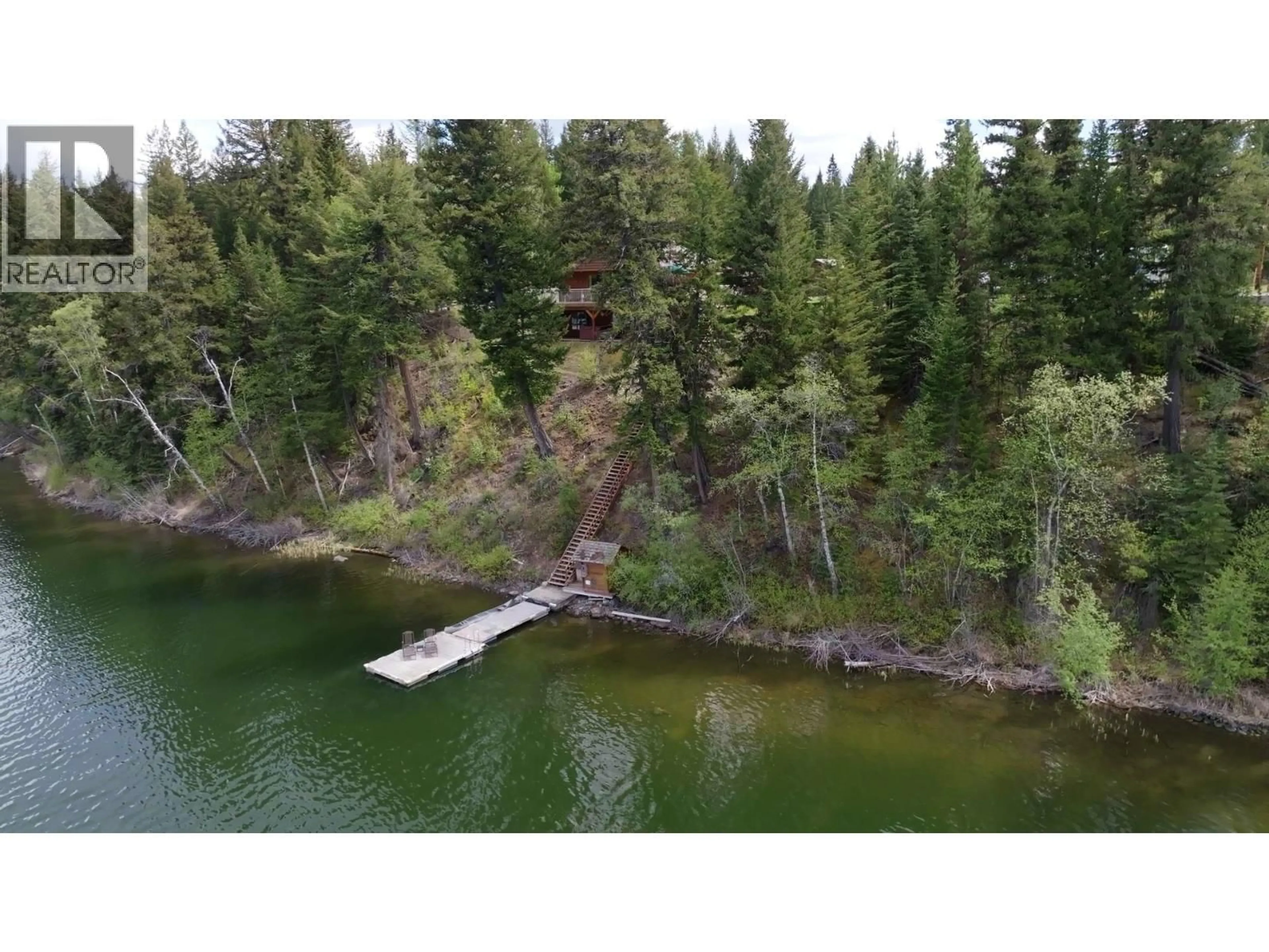 A pic from outside/outdoor area/front of a property/back of a property/a pic from drone, water/lake/river/ocean view for 6649 SVEN ROAD, 100 Mile House British Columbia V0K1X3
