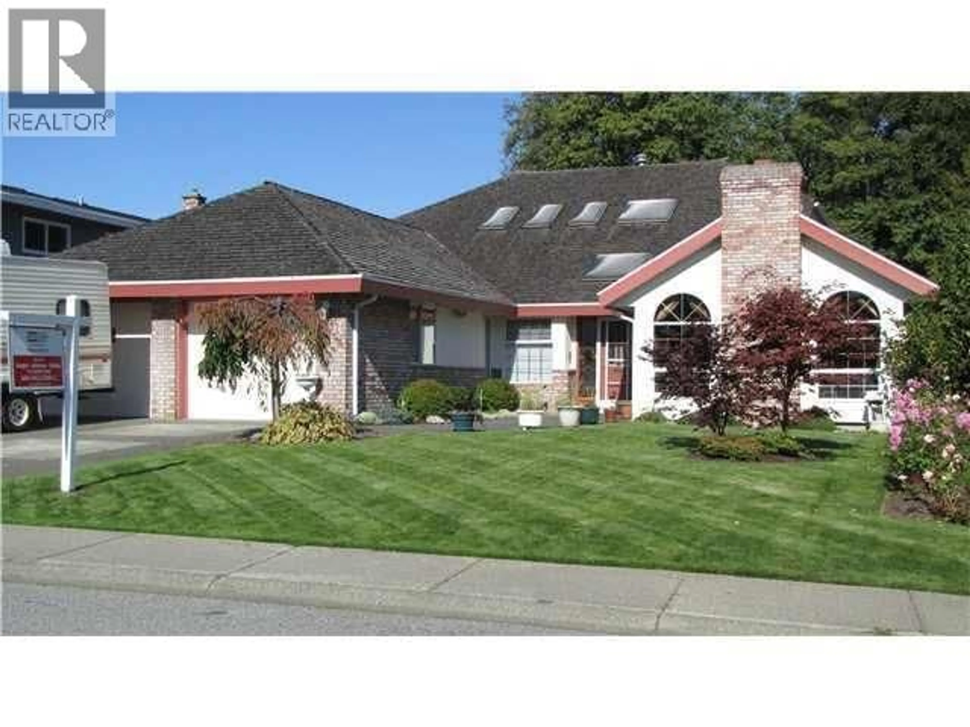 Home with vinyl exterior material, street for 5107 2A AVENUE, Delta British Columbia V4M3N7