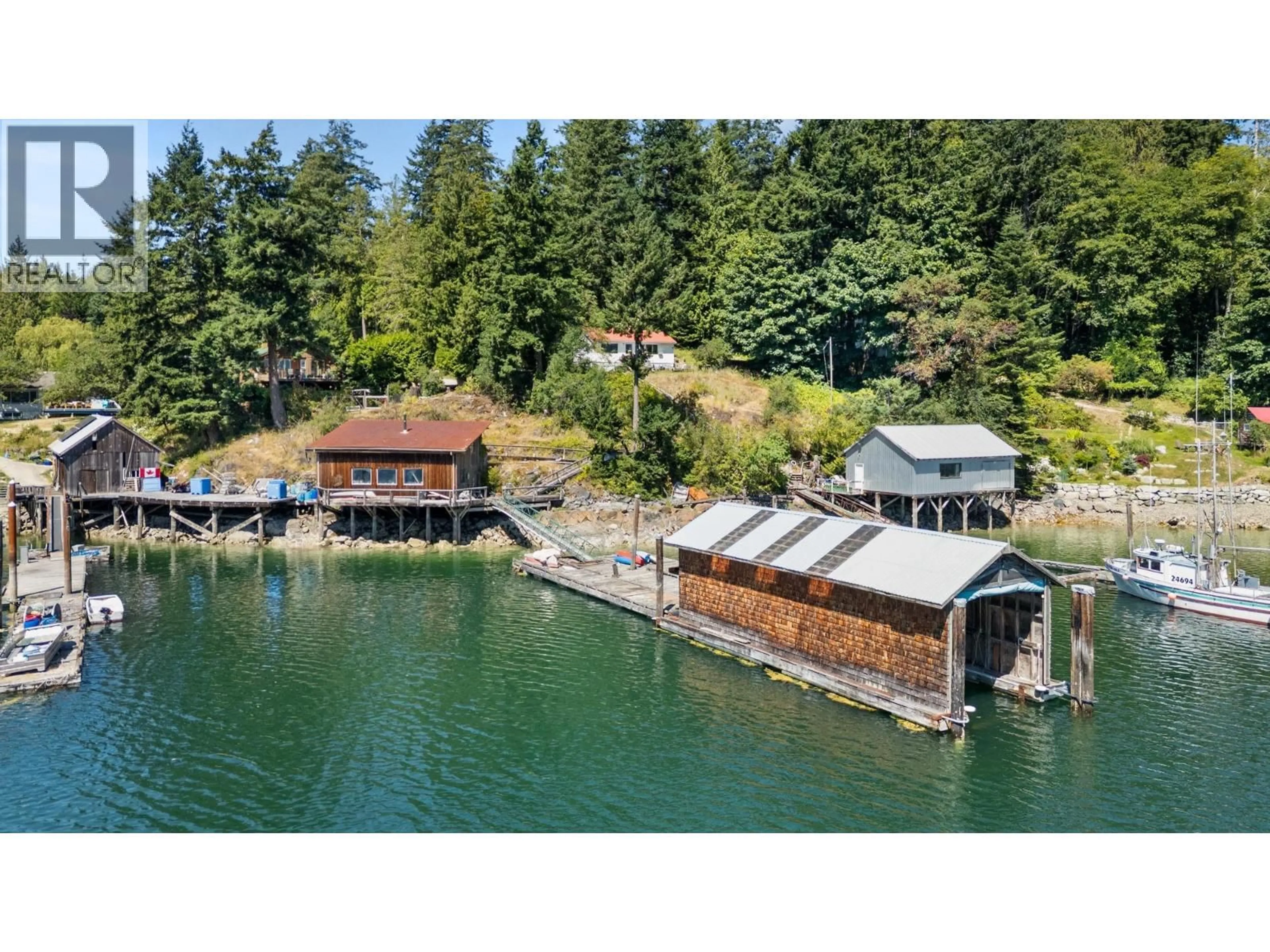 A pic from outside/outdoor area/front of a property/back of a property/a pic from drone, water/lake/river/ocean view for 4371 FRANCIS PENINSULA ROAD, Madeira Park British Columbia V0N2H1