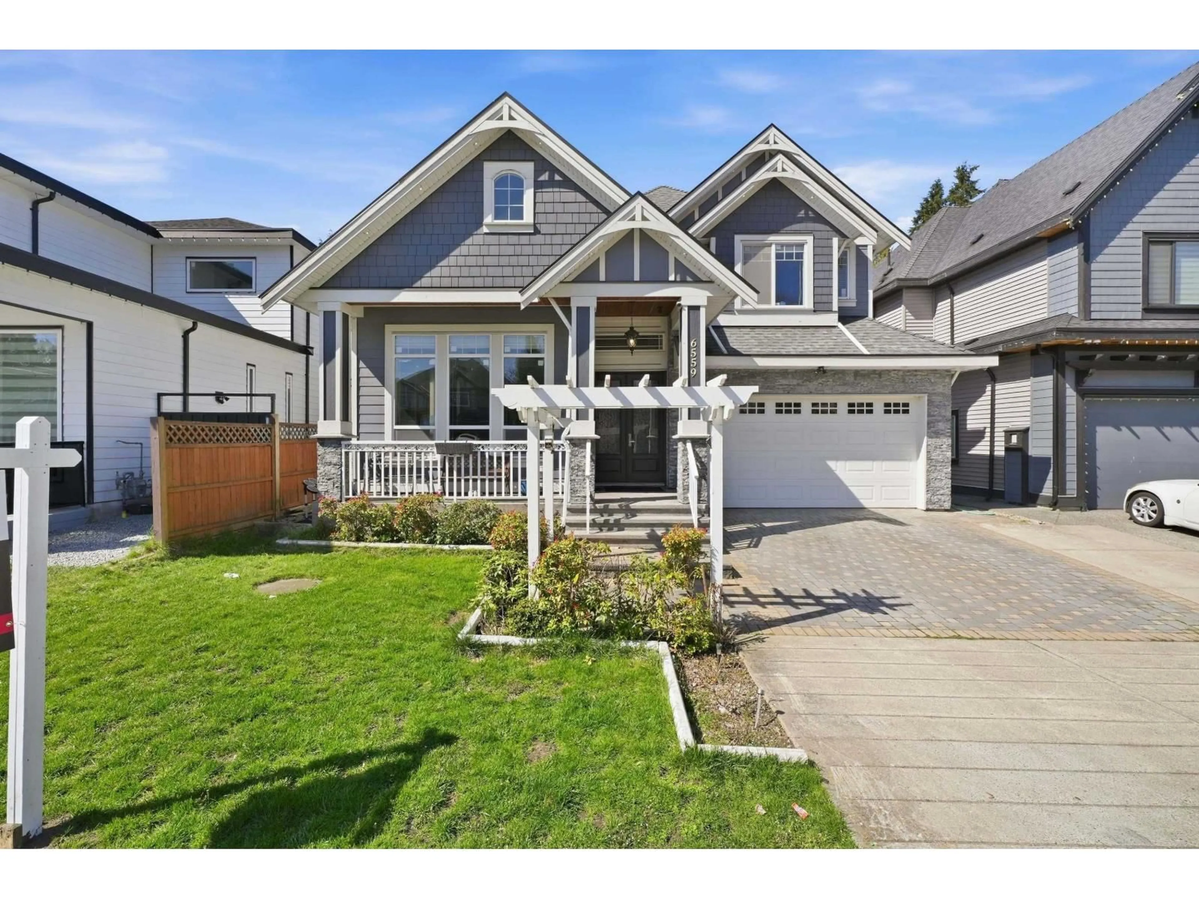 Home with vinyl exterior material, street for 6559 142 STREET, Surrey British Columbia V3W5M5