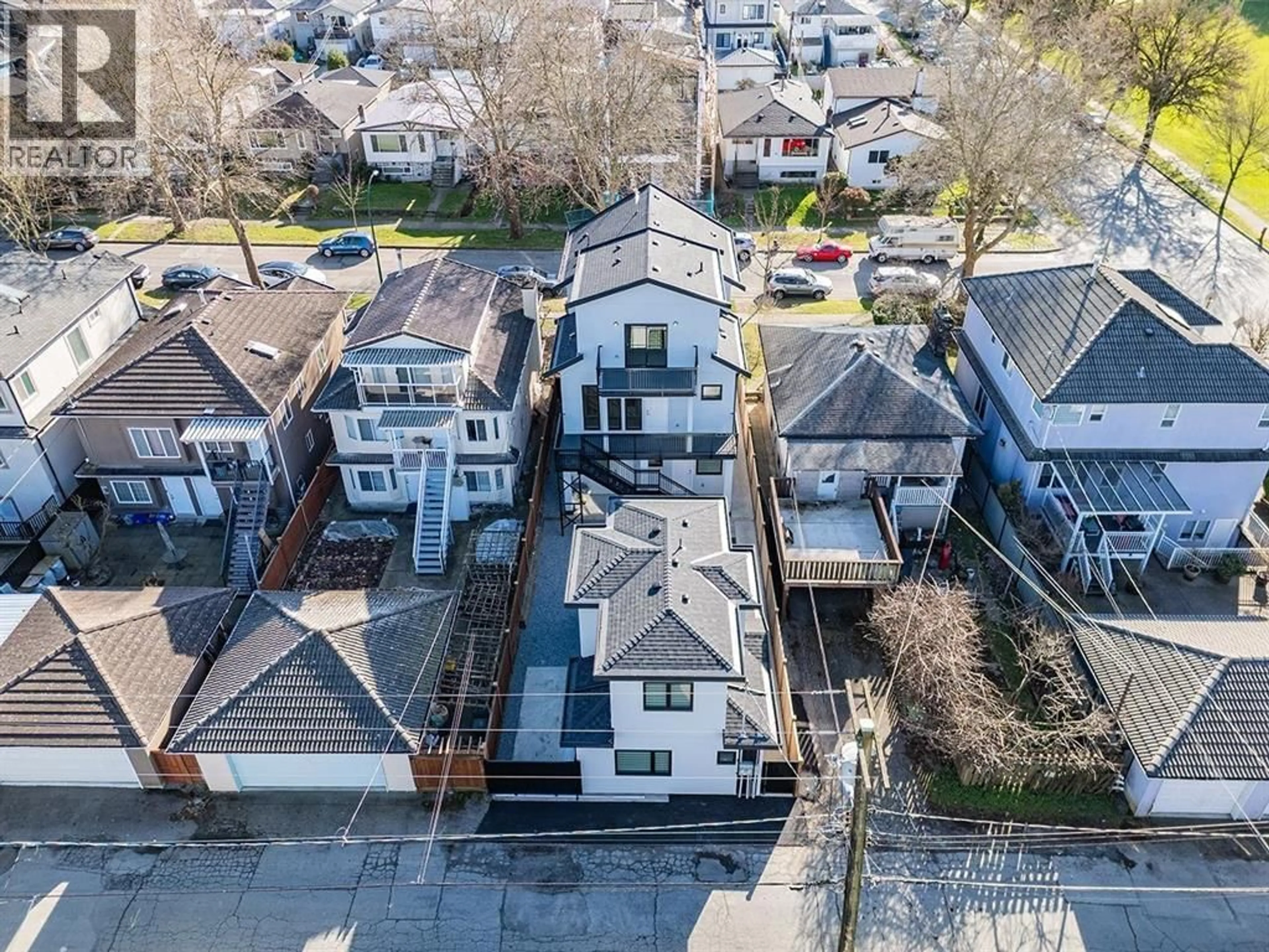 A pic from outside/outdoor area/front of a property/back of a property/a pic from drone, street for 3015 19TH AVENUE, Vancouver British Columbia V5M2S8