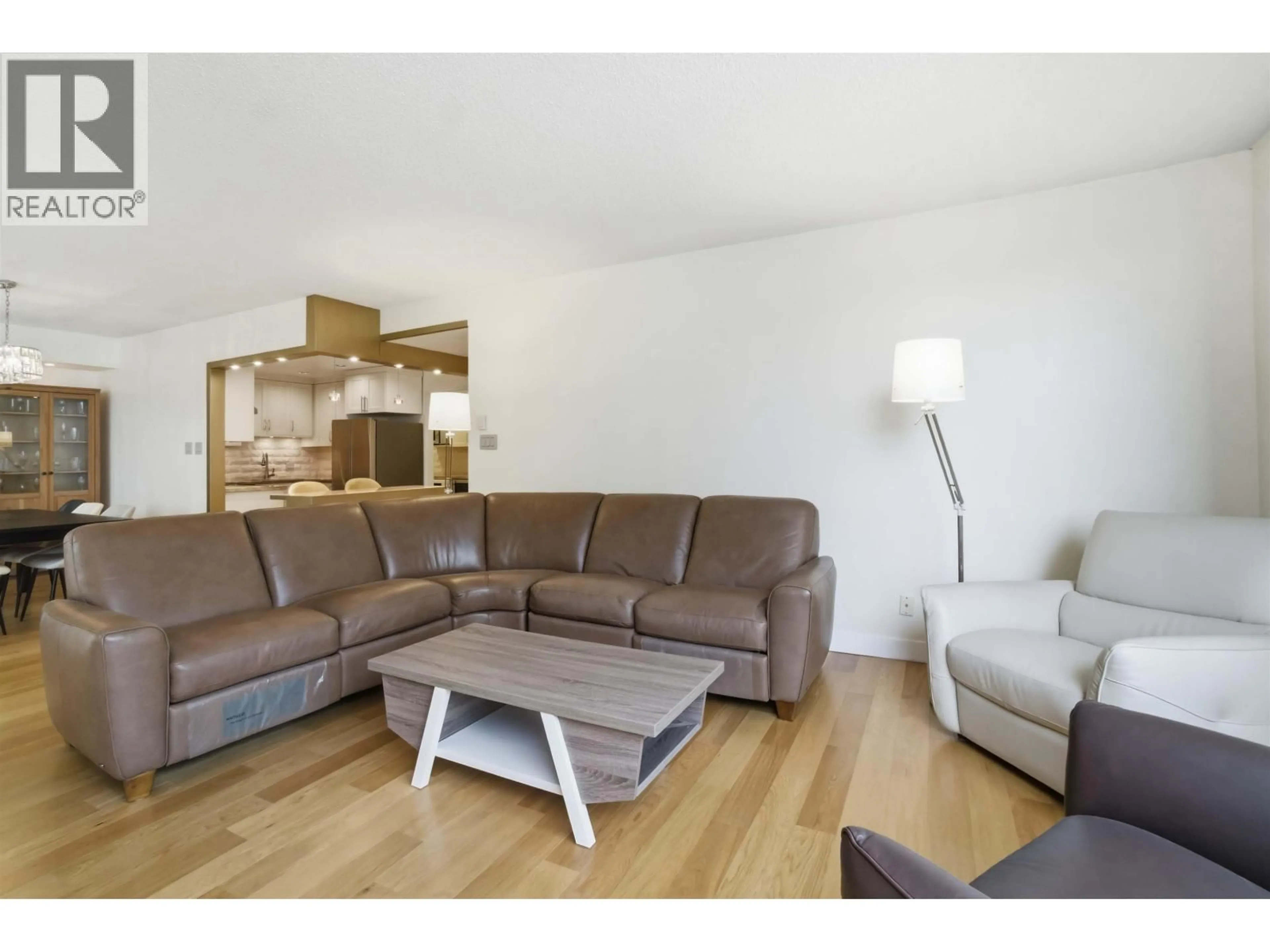 Living room with furniture, wood/laminate floor for 601 - 738 BROUGHTON STREET, Vancouver British Columbia V6G3A7