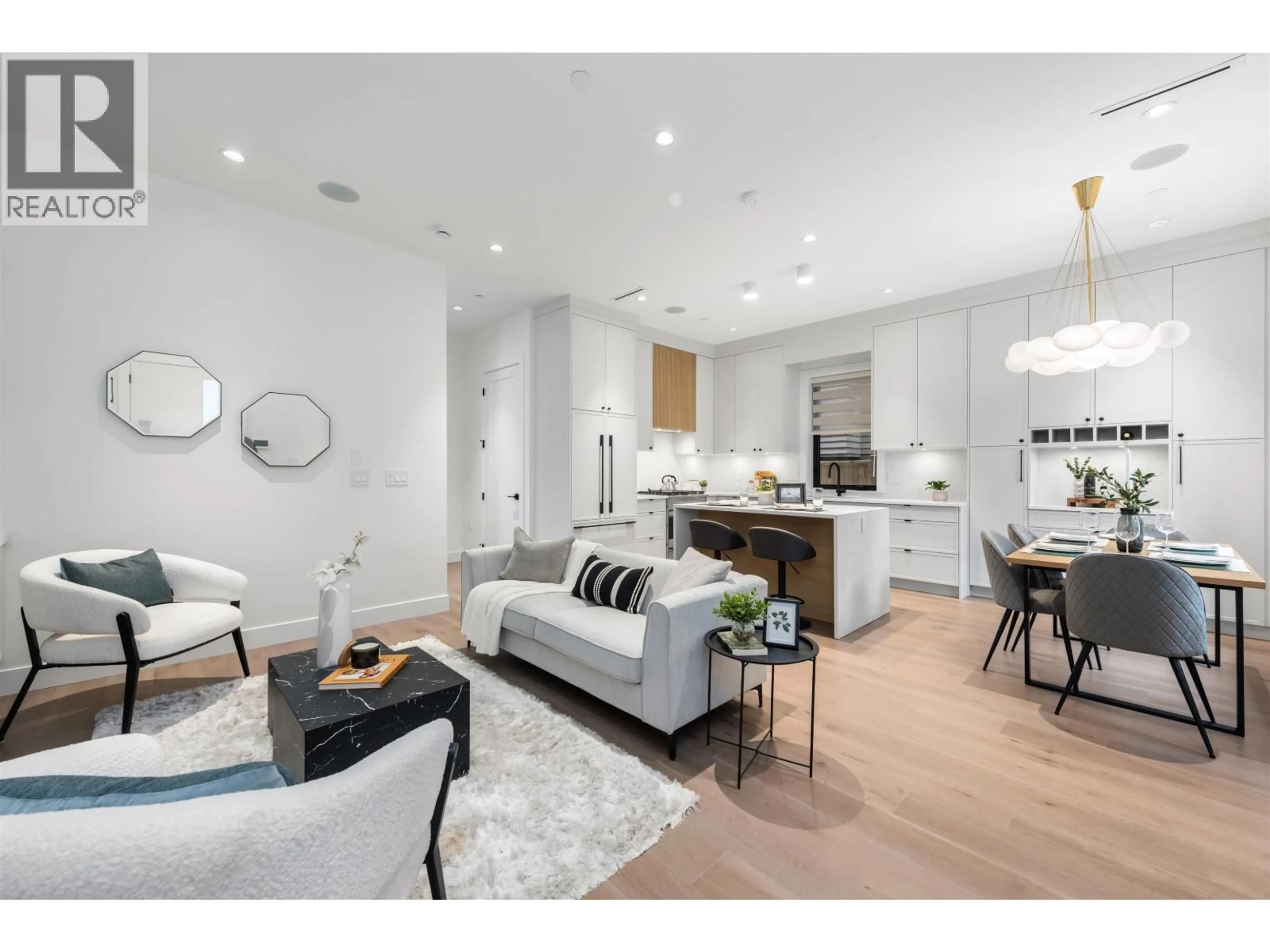 Open concept kitchen, wood/laminate floor for 1 - 878 37 AVENUE, Vancouver British Columbia V5W1G2