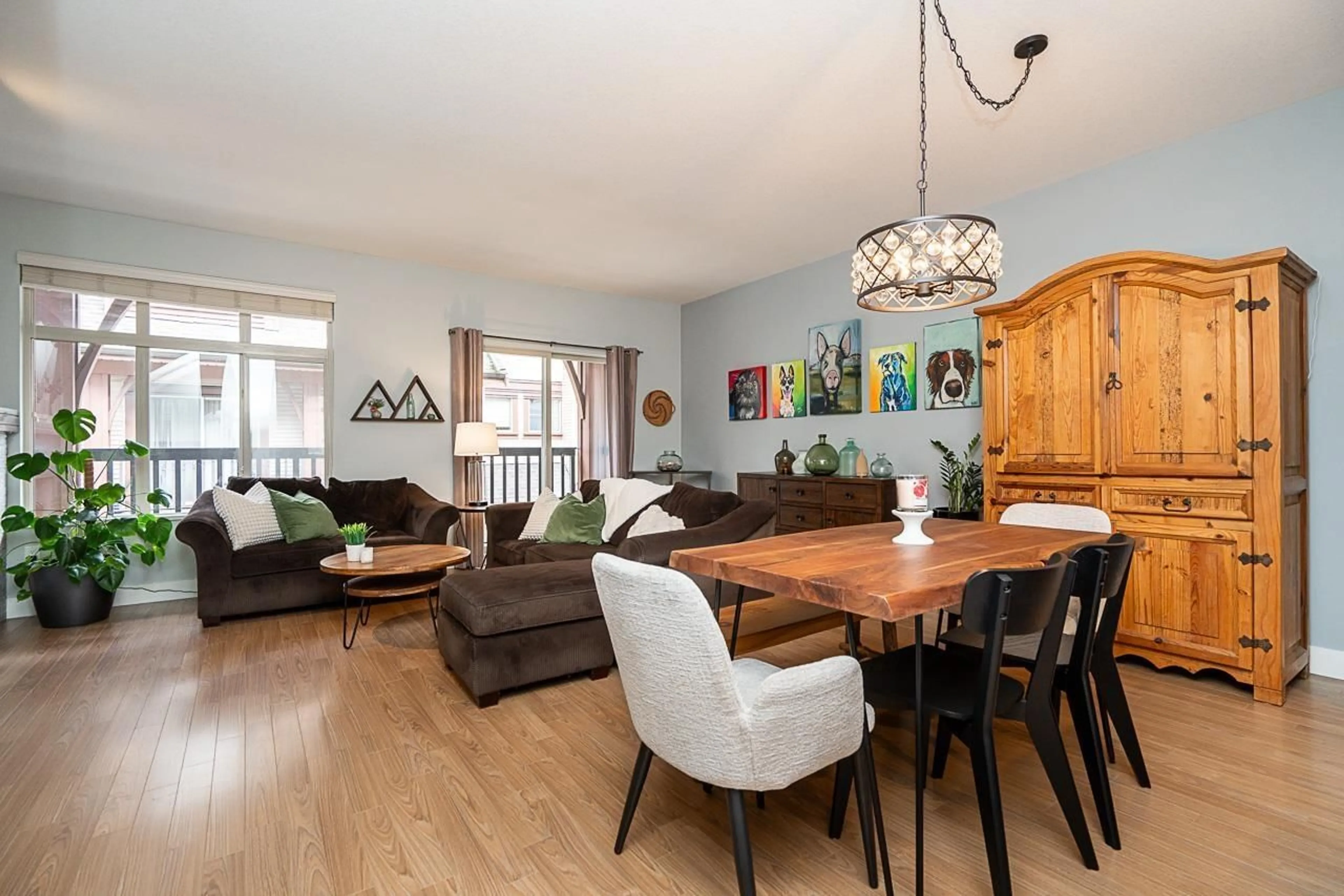 Living room with furniture, wood/laminate floor for 7 - 19479 65 AVENUE, Surrey British Columbia V4N5X6