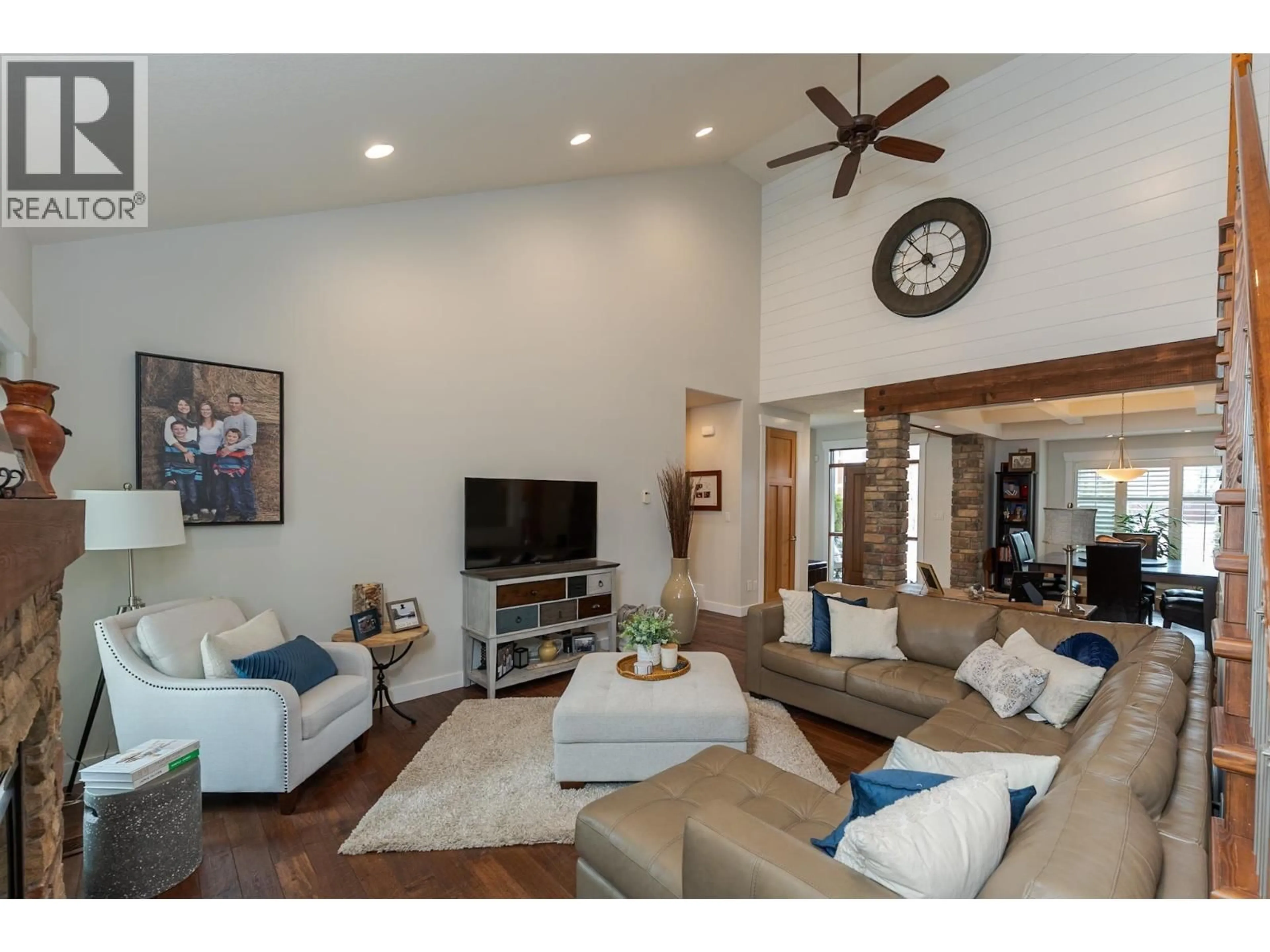 Living room with furniture, wood/laminate floor for 7613 LOEDEL CRESCENT, Prince George British Columbia V2N0A5