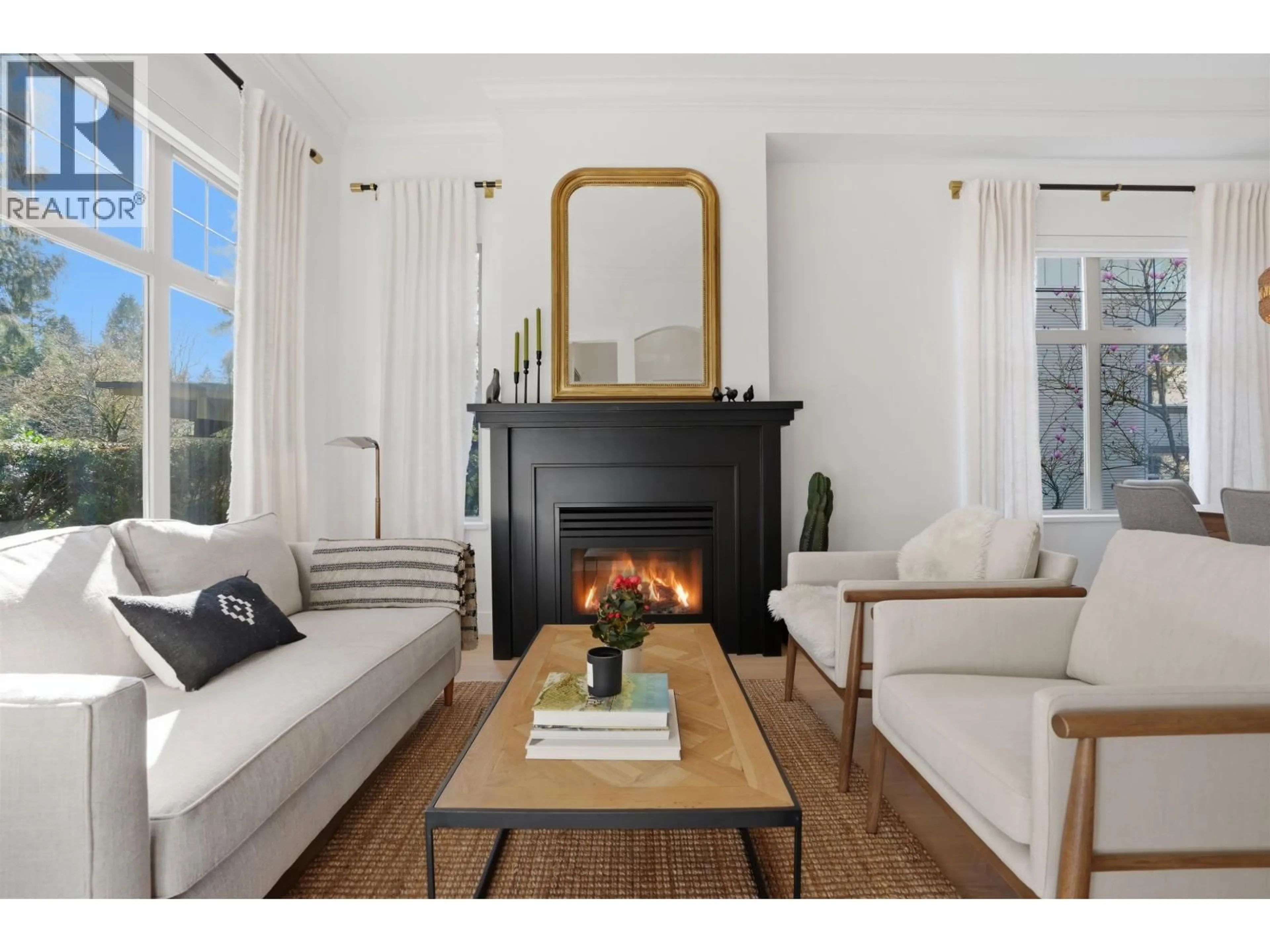 Living room with furniture, wood/laminate floor for 2039 33RD AVENUE, Vancouver British Columbia V6M1B6