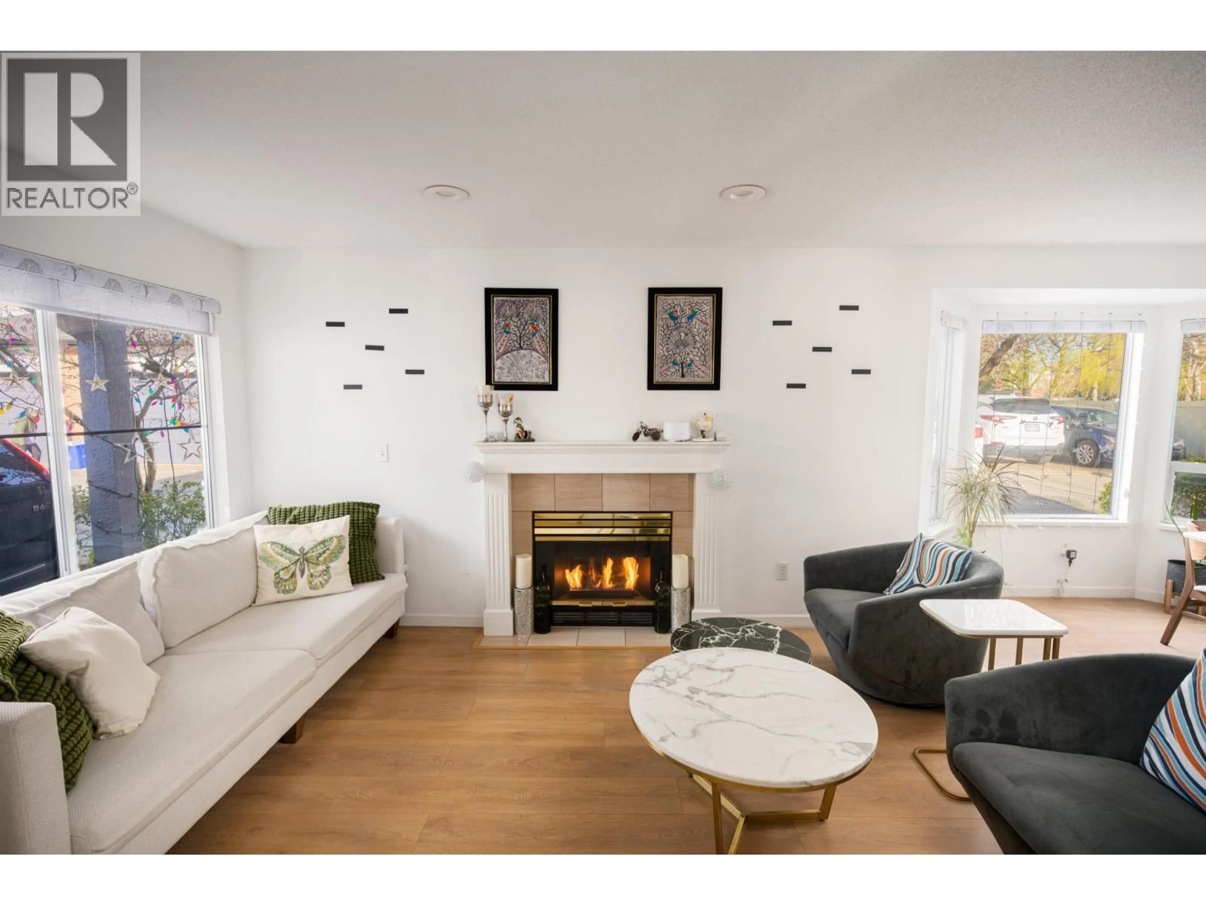 Living room with furniture, wood/laminate floor for 54 - 8120 GENERAL CURRIE ROAD, Richmond British Columbia V6Y3V8