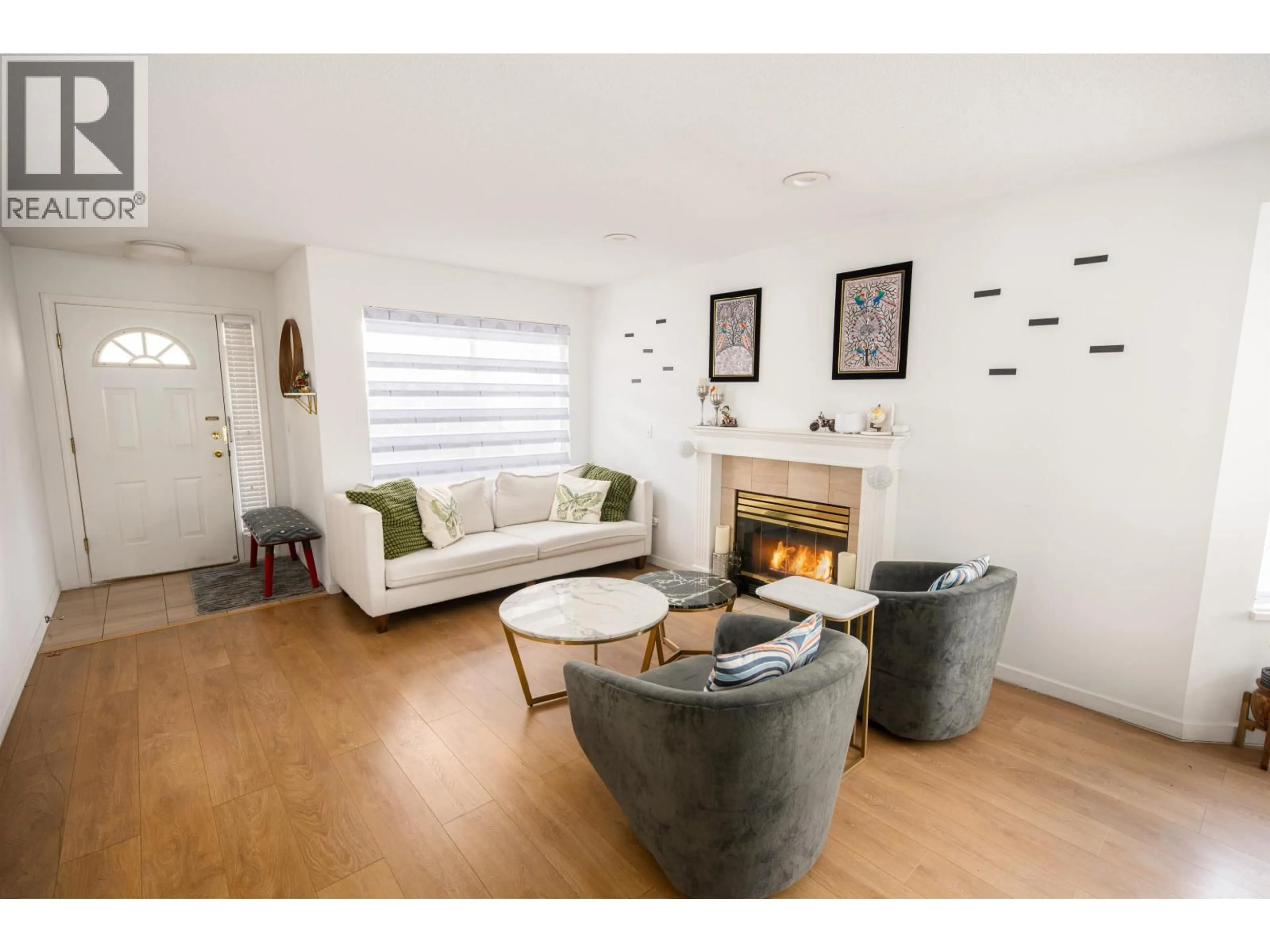 Living room with furniture, wood/laminate floor for 54 - 8120 GENERAL CURRIE ROAD, Richmond British Columbia V6Y3V8