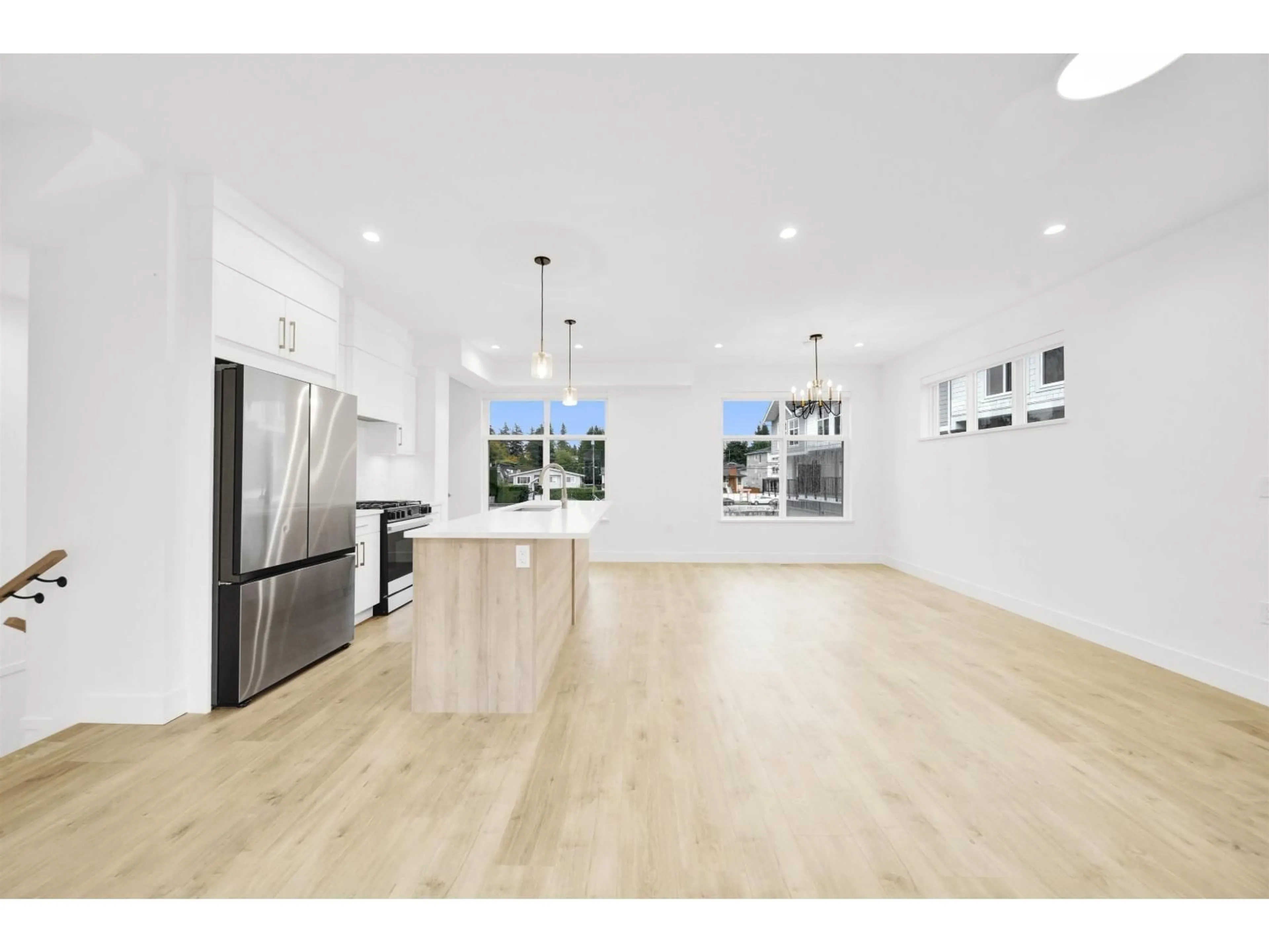 Open concept kitchen, wood/laminate floor for 7 - 12770 105 AVENUE, Surrey British Columbia V3V0H2