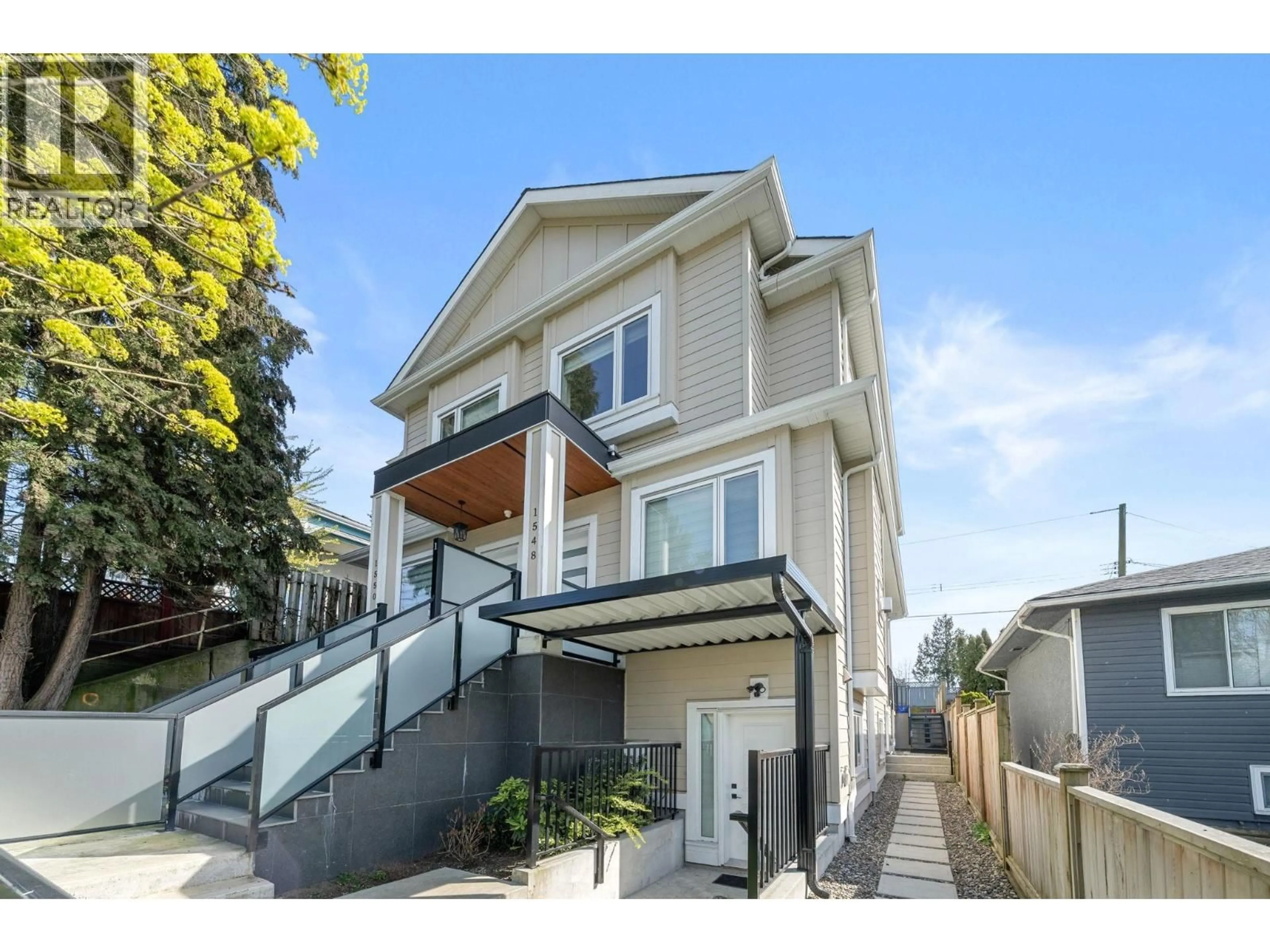 Home with vinyl exterior material, street for 1548 41ST AVENUE, Vancouver British Columbia V5P1K2