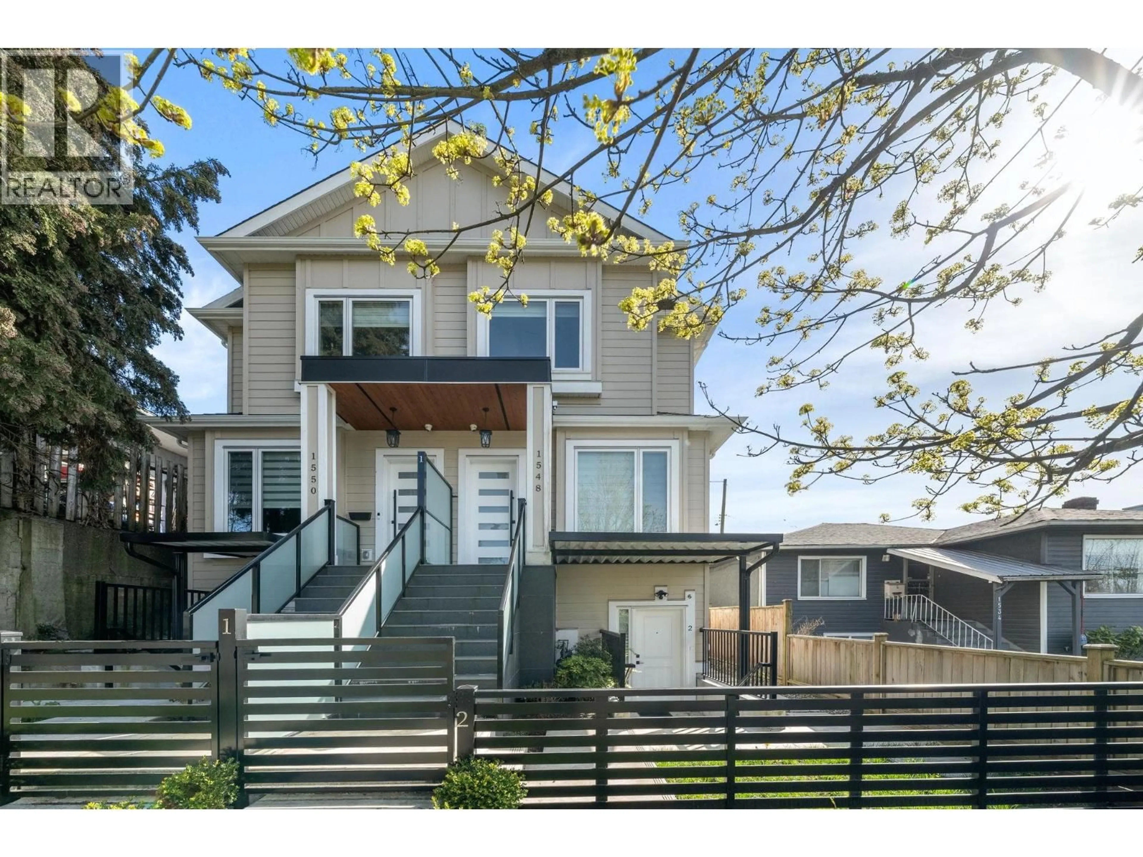 Home with vinyl exterior material, street for 1548 41ST AVENUE, Vancouver British Columbia V5P1K2