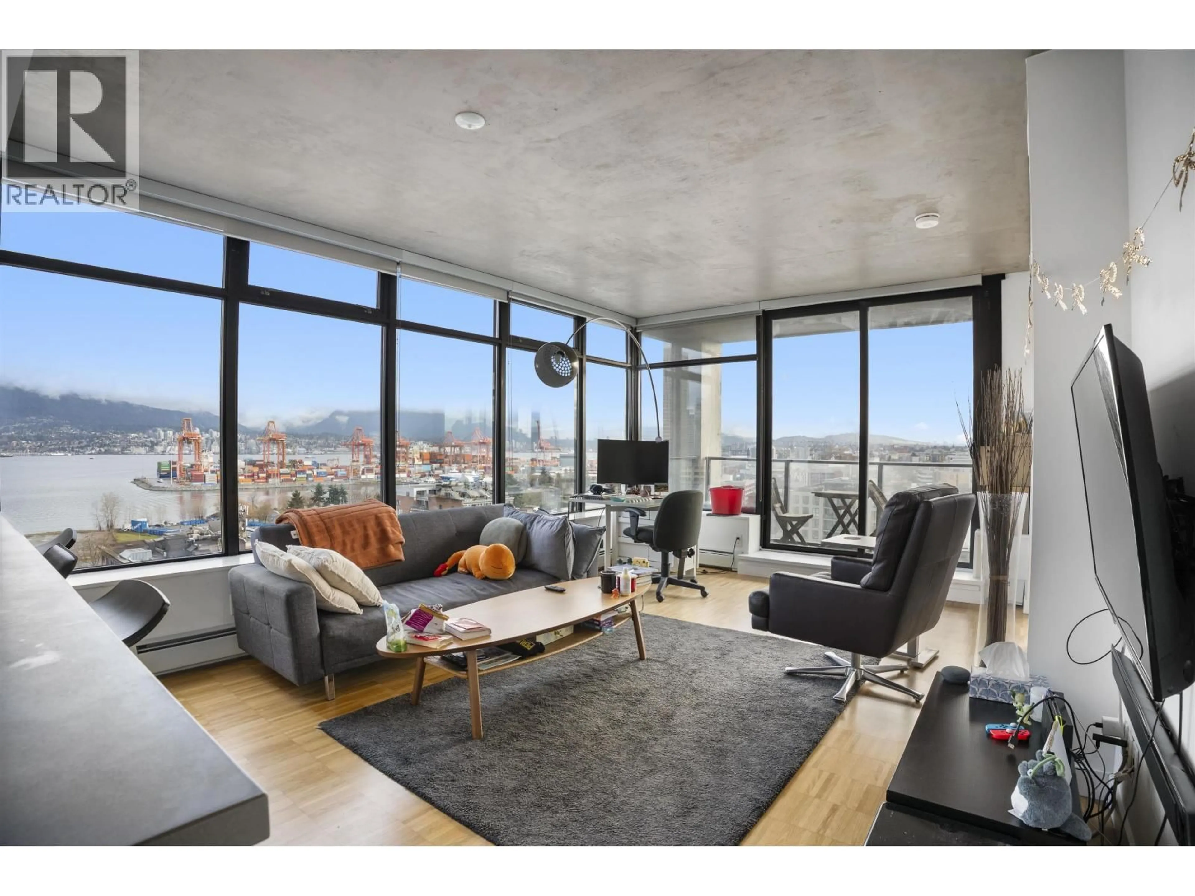 Living room with furniture, cement floor for 1401 - 108 CORDOVA STREET, Vancouver British Columbia V6B0G5