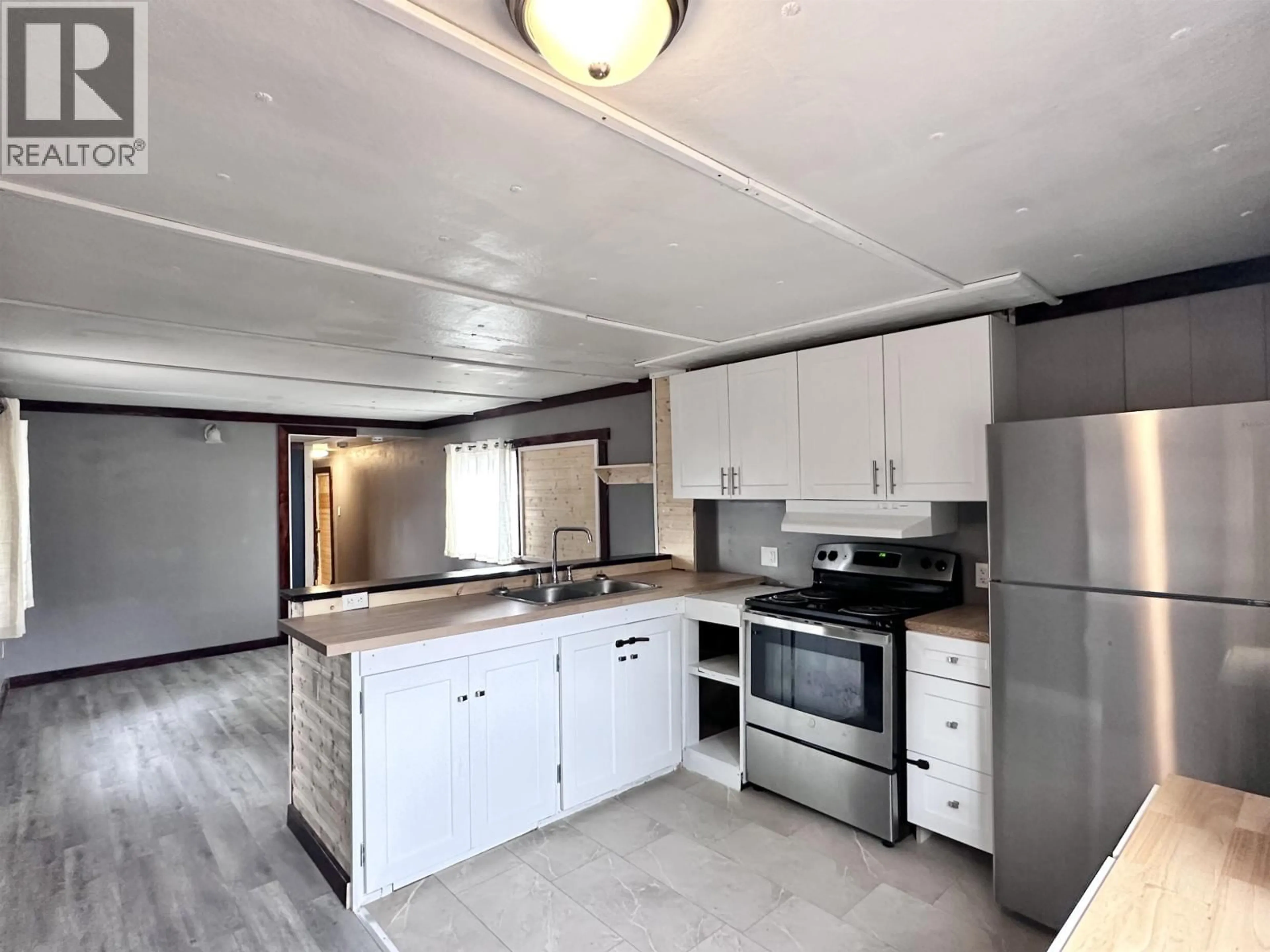 Open concept kitchen, unknown for 1145 4TH AVENUE, Valemount British Columbia V0E2Z0