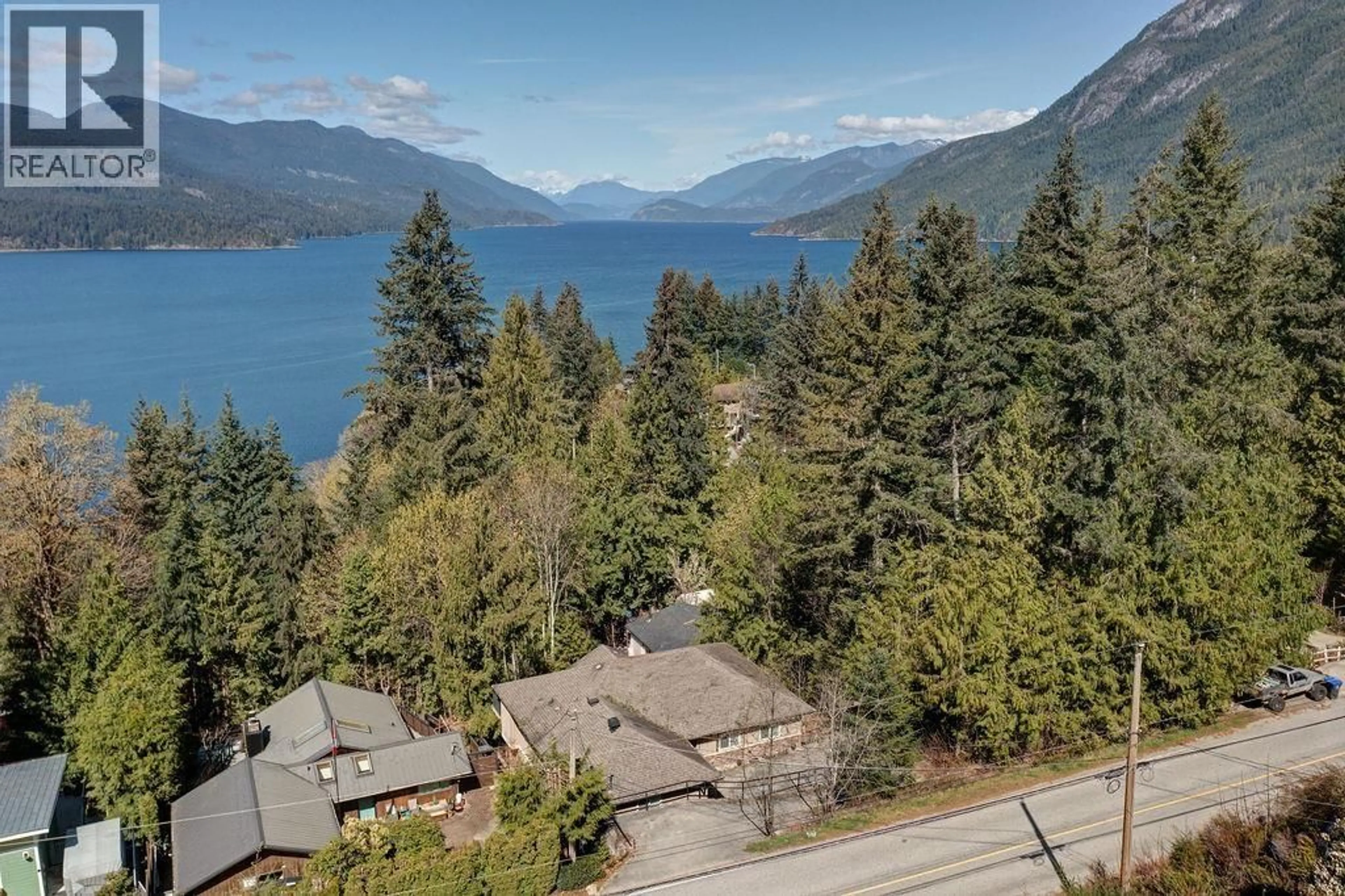 A pic from outside/outdoor area/front of a property/back of a property/a pic from drone, water/lake/river/ocean view for 5886 SANDY HOOK ROAD, Sechelt British Columbia V7Z0P4