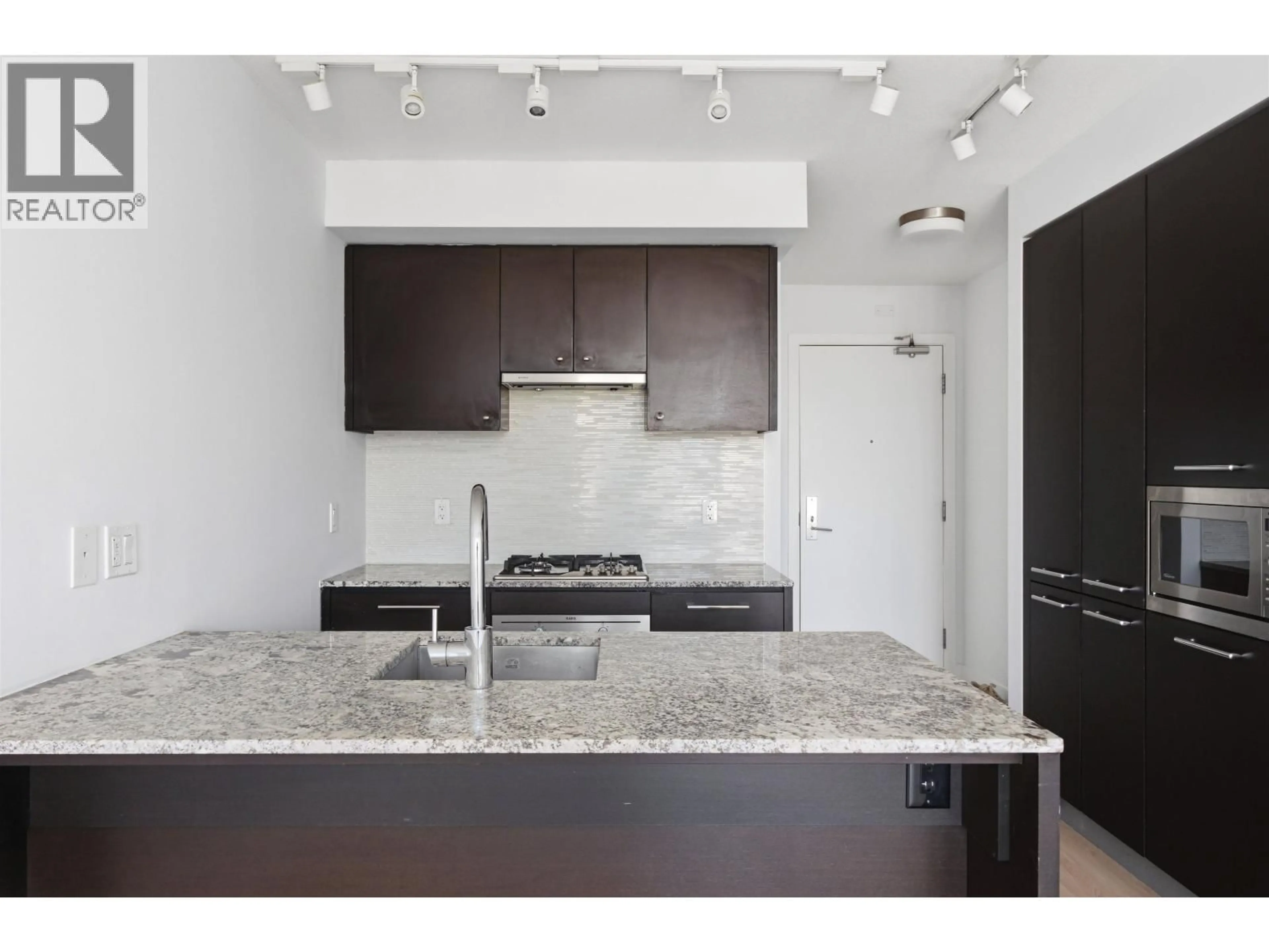 Open concept kitchen, ceramic/tile floor for 610 - 6180 COONEY ROAD, Richmond British Columbia V6Y0H2