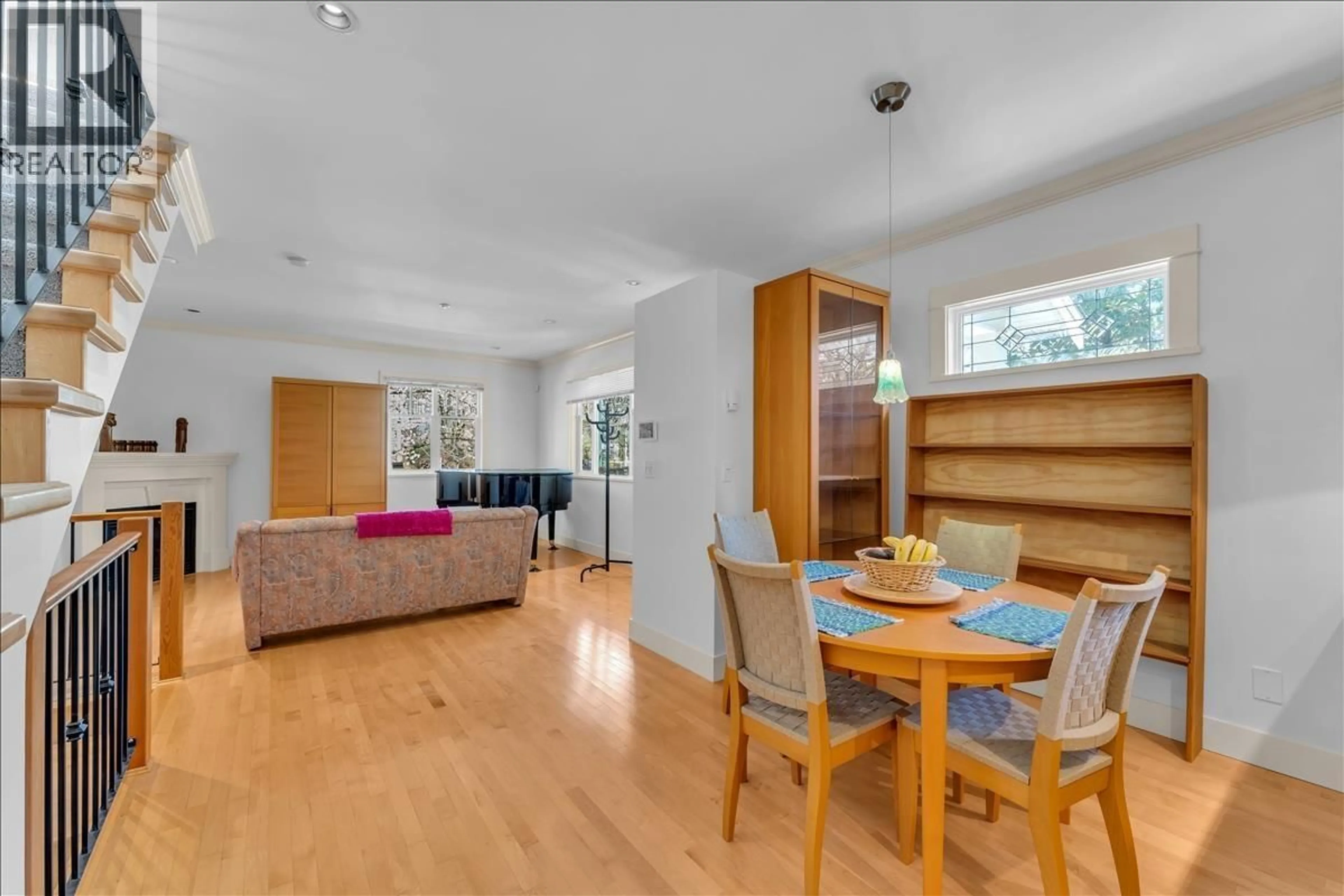 Living room with furniture, wood/laminate floor for 2301 STEPHENS STREET, Vancouver British Columbia V6K3W7