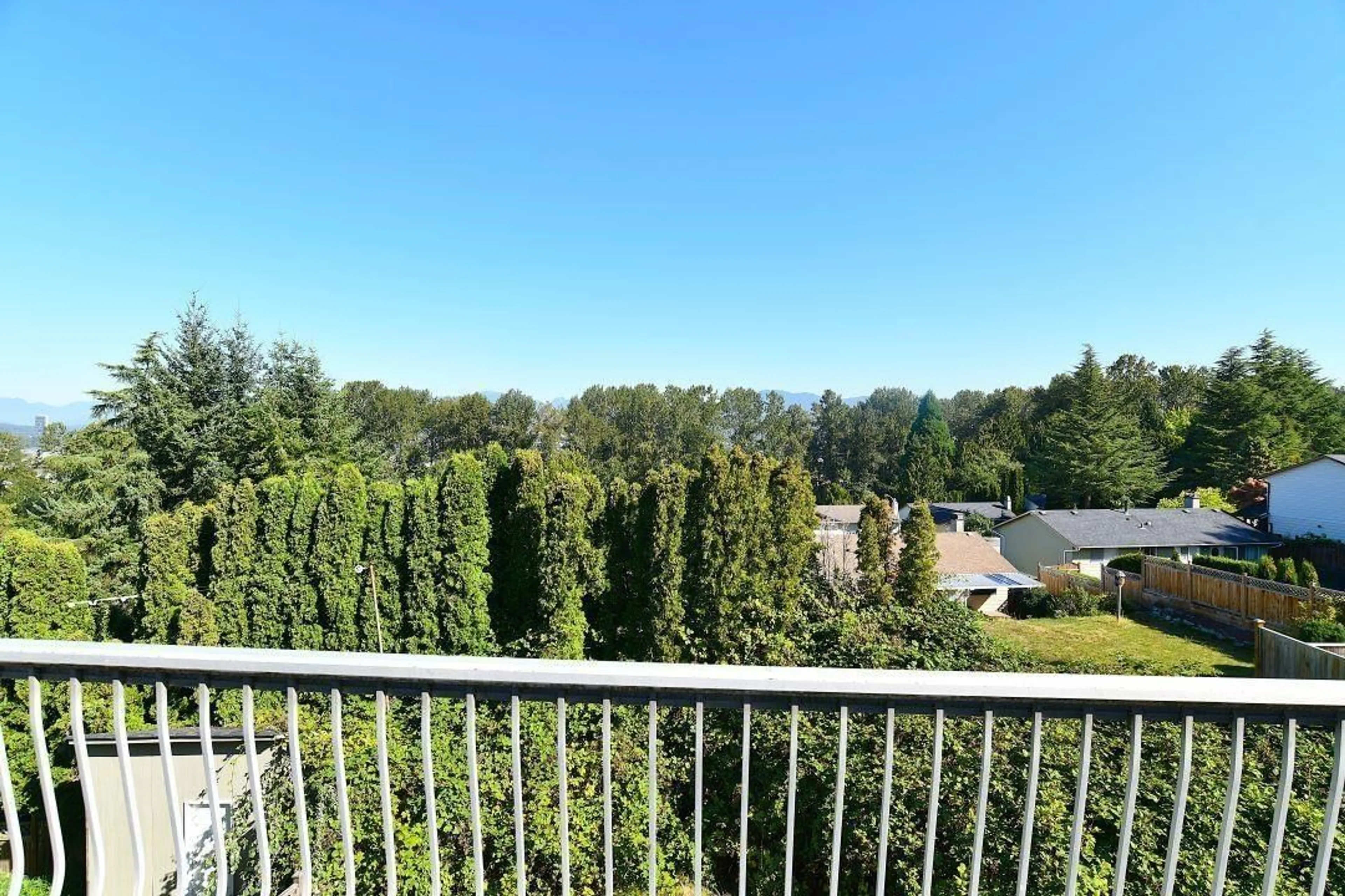 Balcony in the apartment, forest/trees view for 13495 113 AVENUE, Surrey British Columbia V3R6S9
