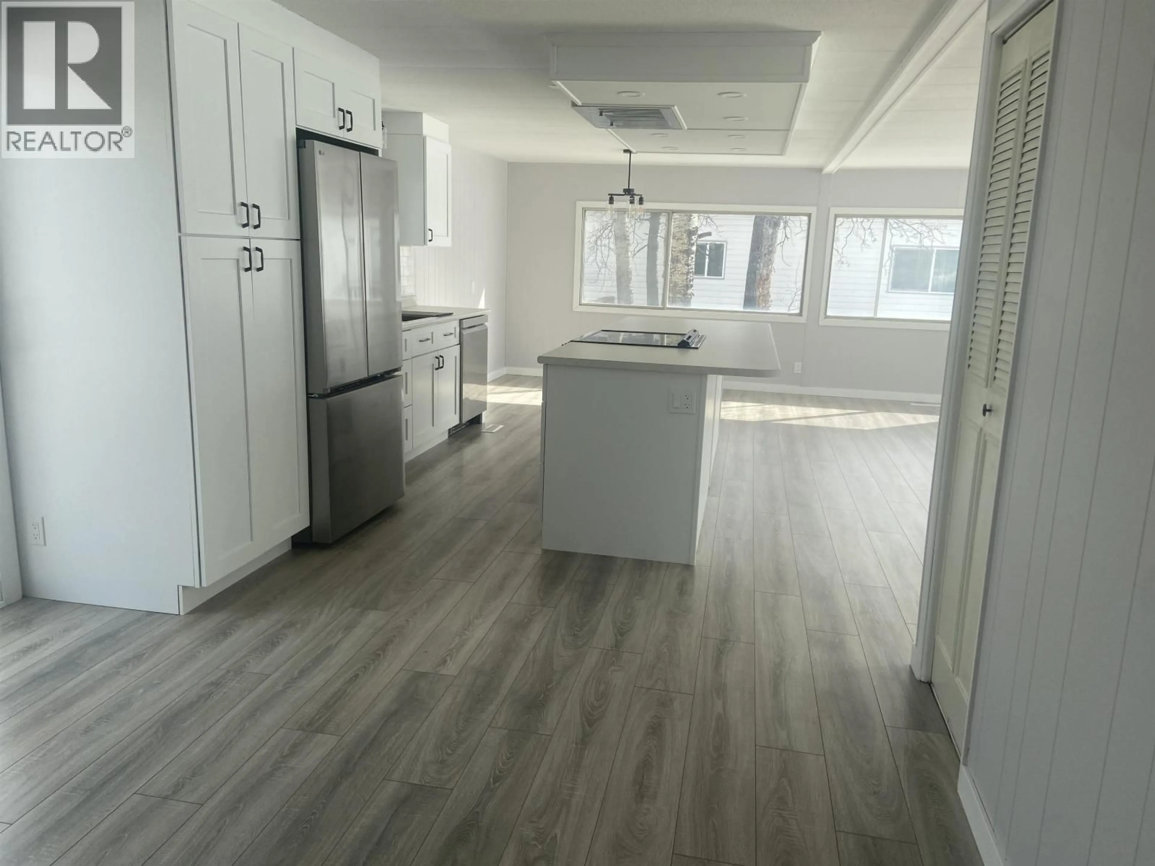 Open concept kitchen, unknown for 8519 76 STREET, Fort St. John British Columbia V1J2Z4