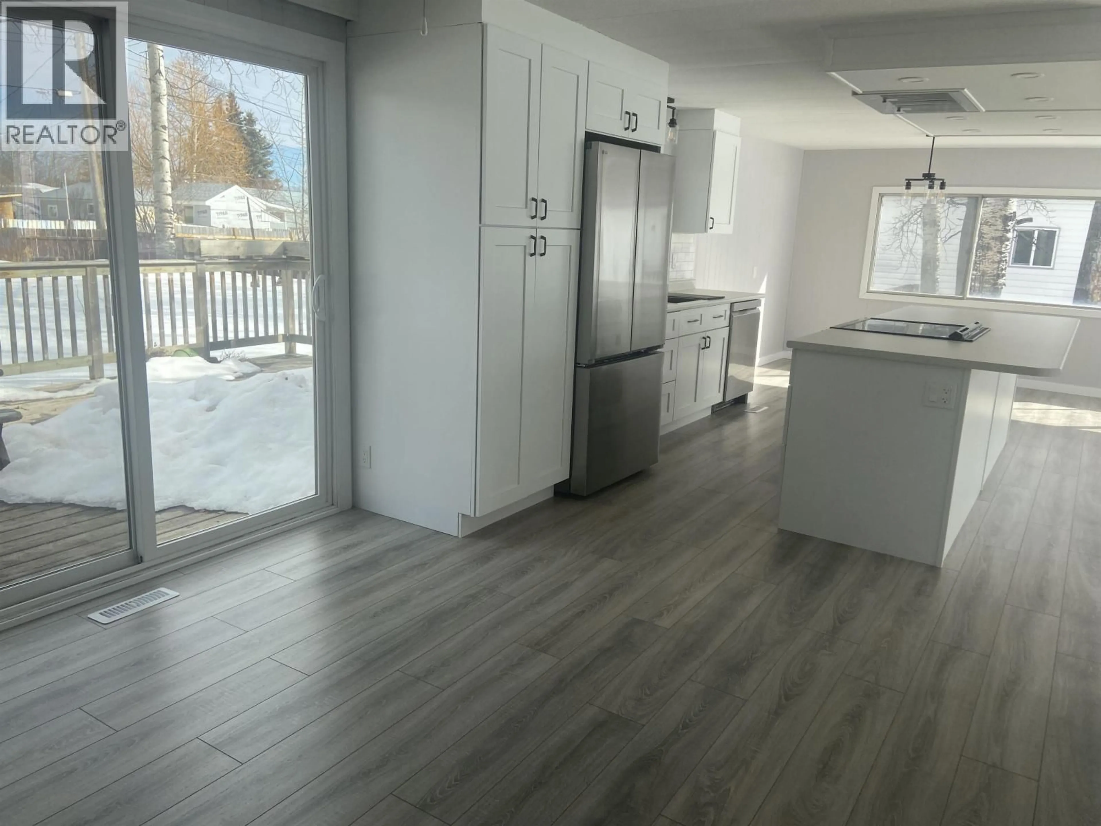 Open concept kitchen, unknown for 8519 76 STREET, Fort St. John British Columbia V1J2Z4