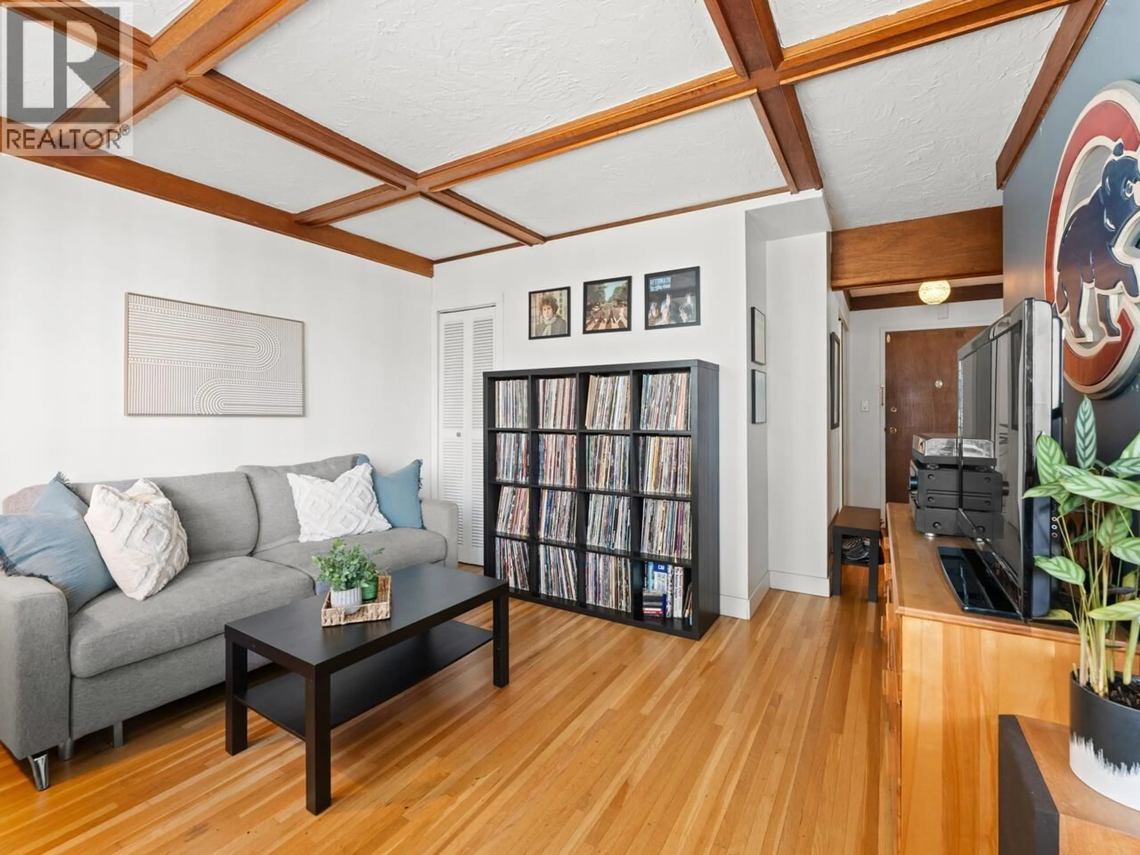 Living room with furniture, wood/laminate floor for 304 - 1975 PENDRELL STREET, Vancouver British Columbia V6G1T6