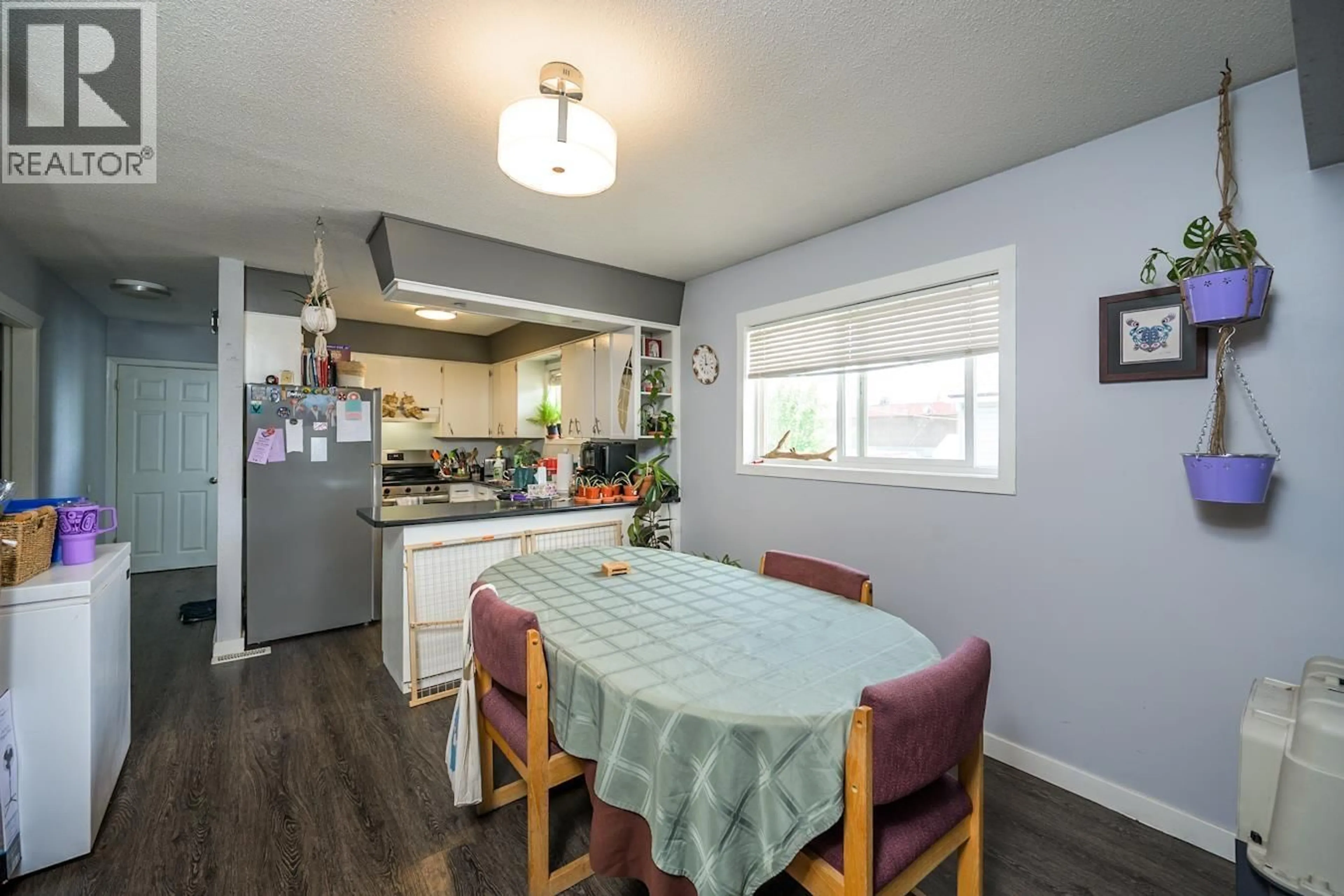 Dining room, wood/laminate floor for 1918 VINE STREET, Prince George British Columbia V2L2W8