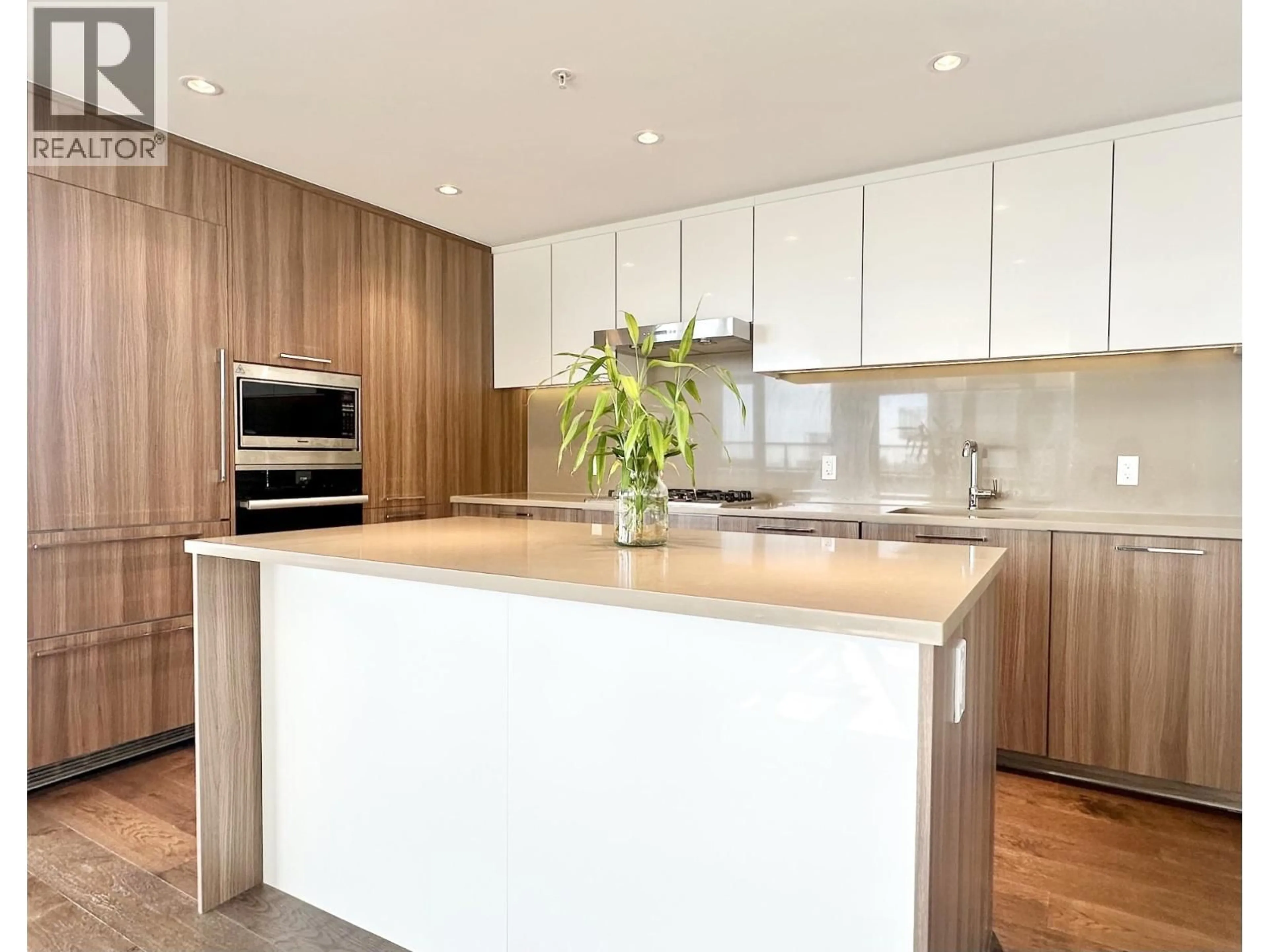 Contemporary kitchen, wood/laminate floor for 1005 - 3280 CORVETTE WAY, Richmond British Columbia V6X0T9